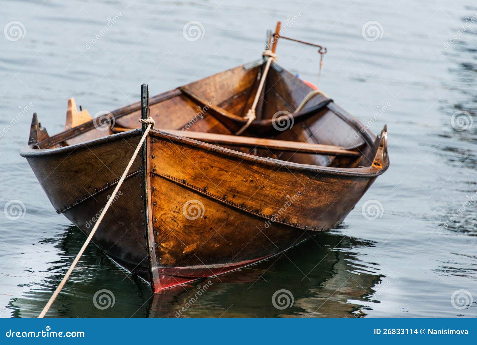 Small Wooden Boat On The Calm Lake Stock Photo, Picture and Royalty Free  Image. Image 94907524.