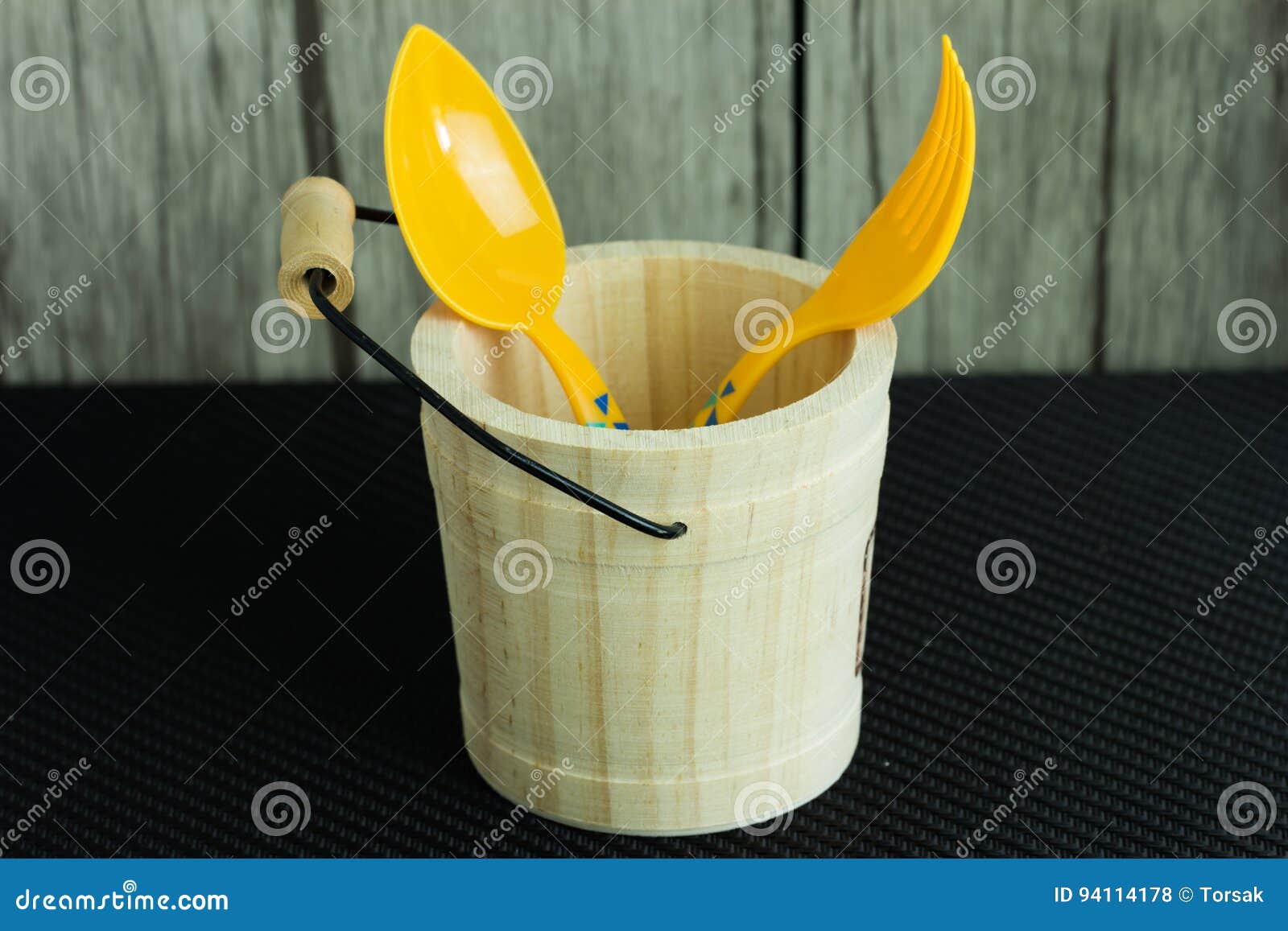 Wooden bucket on table stock photo. Image of bucket, container 94114178