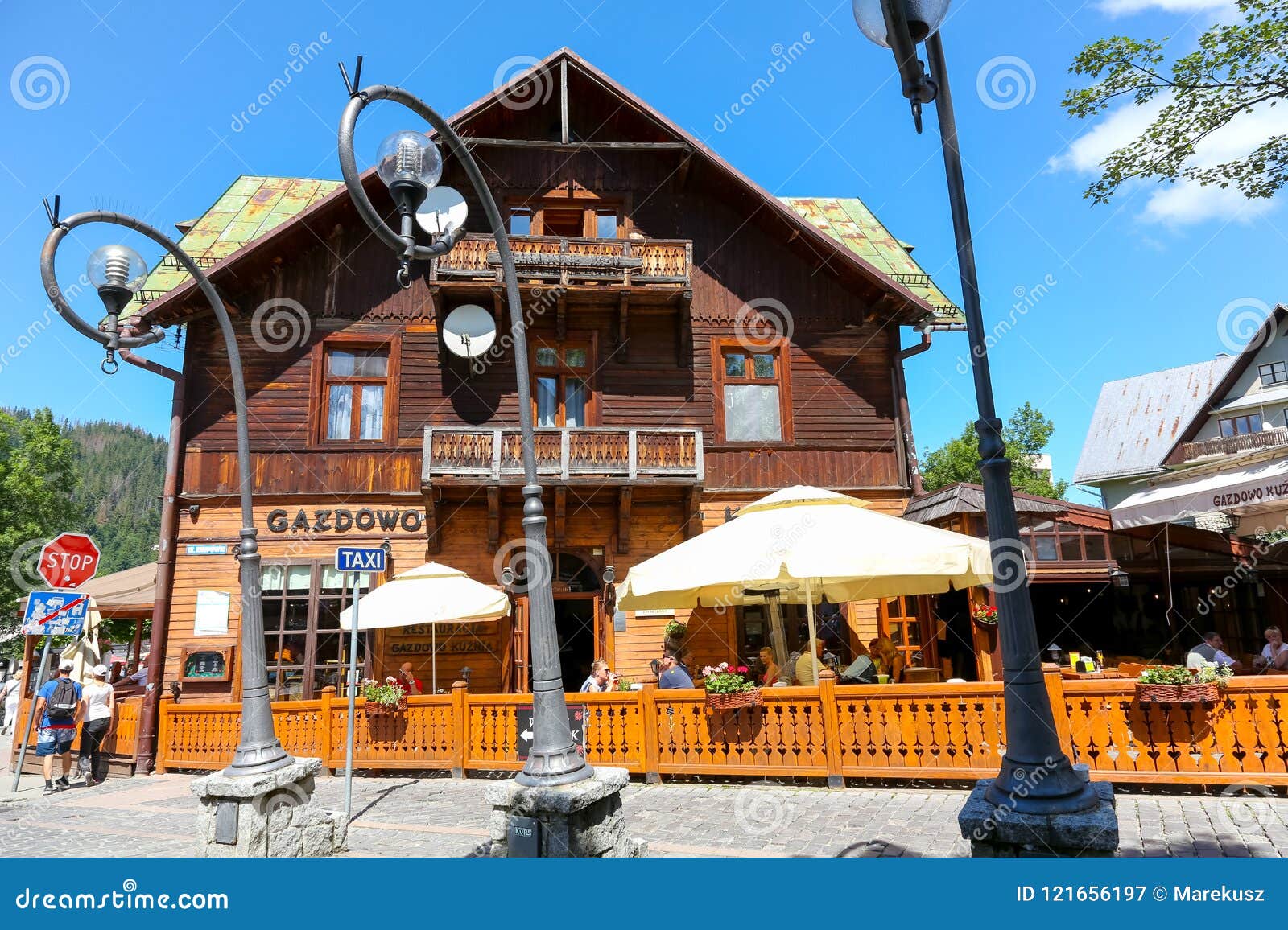 Wooden Building and Outdoor Restaurant in Zakopane Editorial