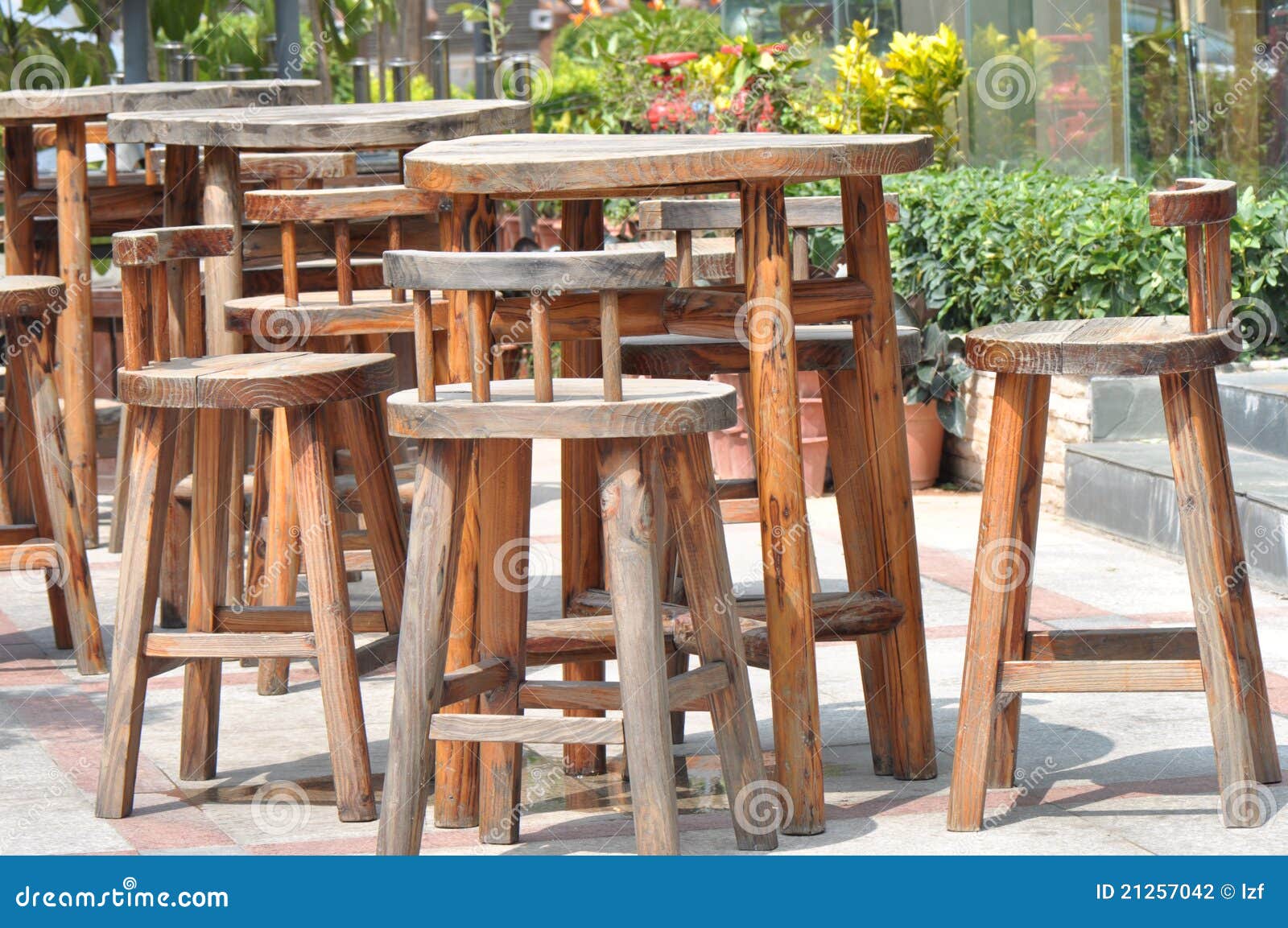 Wooden cafe seats stock photo. Image of shade, public 21257042