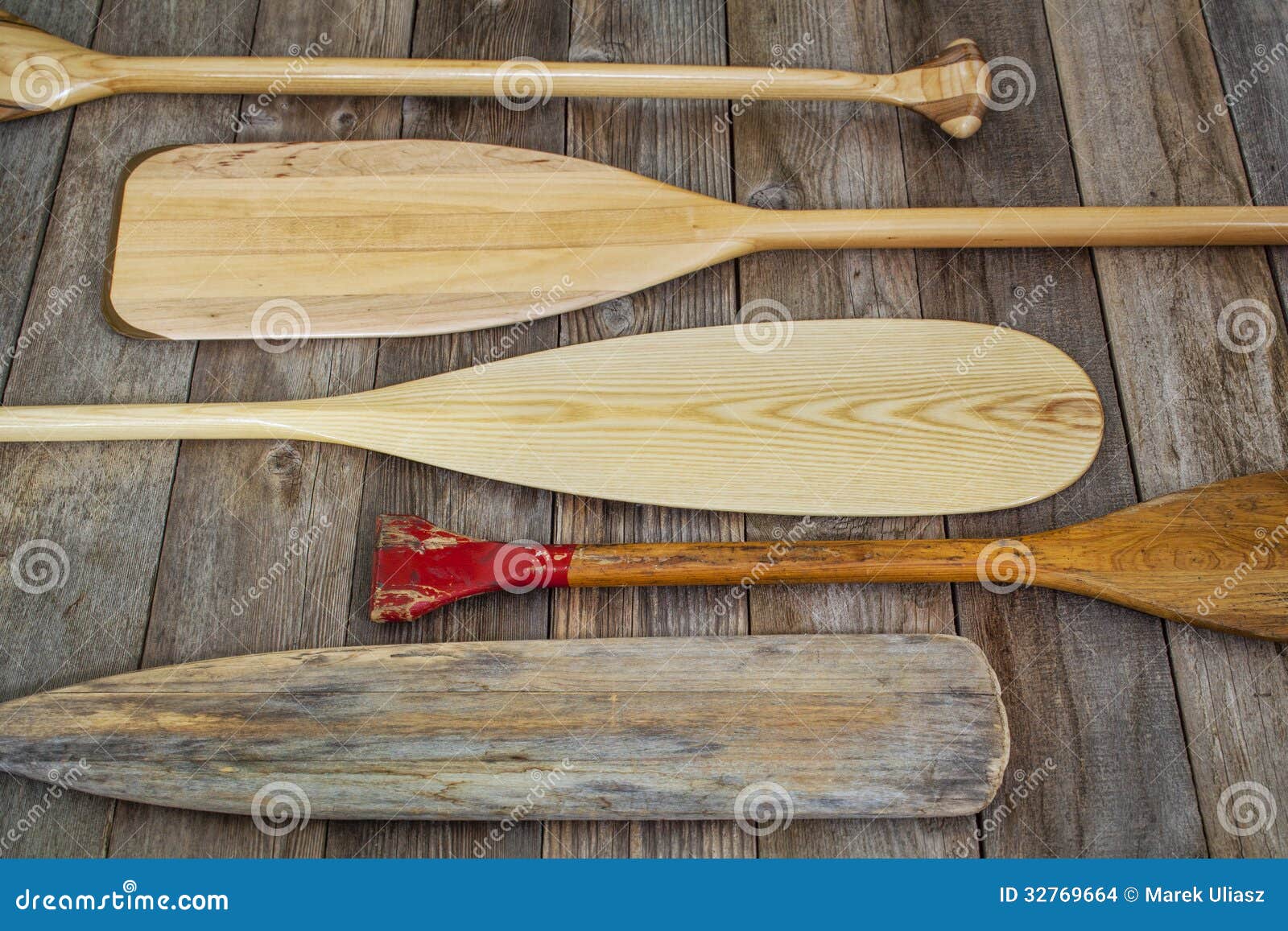 Wooden canoe paddles stock photo. Image of water, canoe 