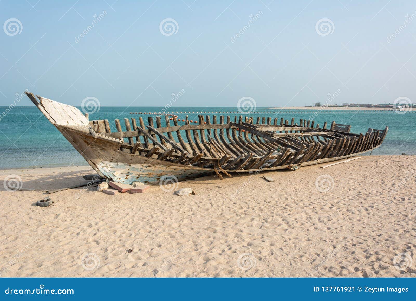 wooden carcass of dhow fishing boat