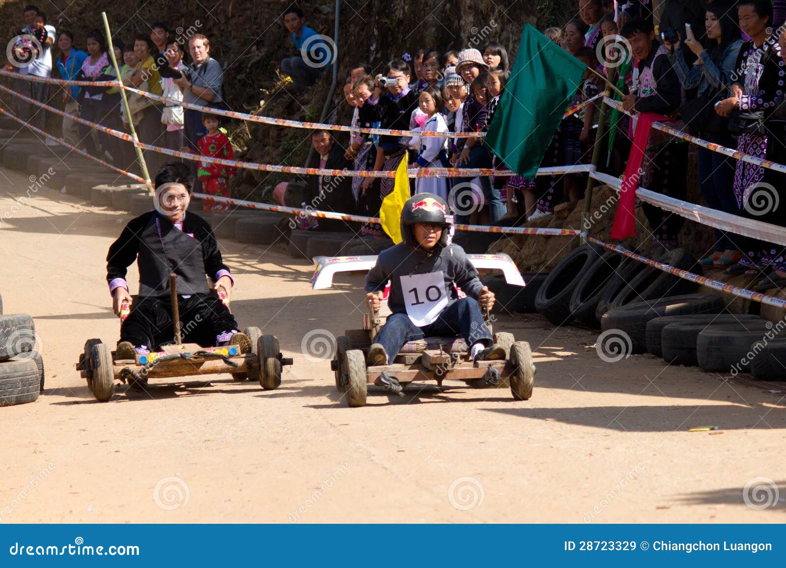 The wooden cart racing. editorial stock image. Image of person 28723329