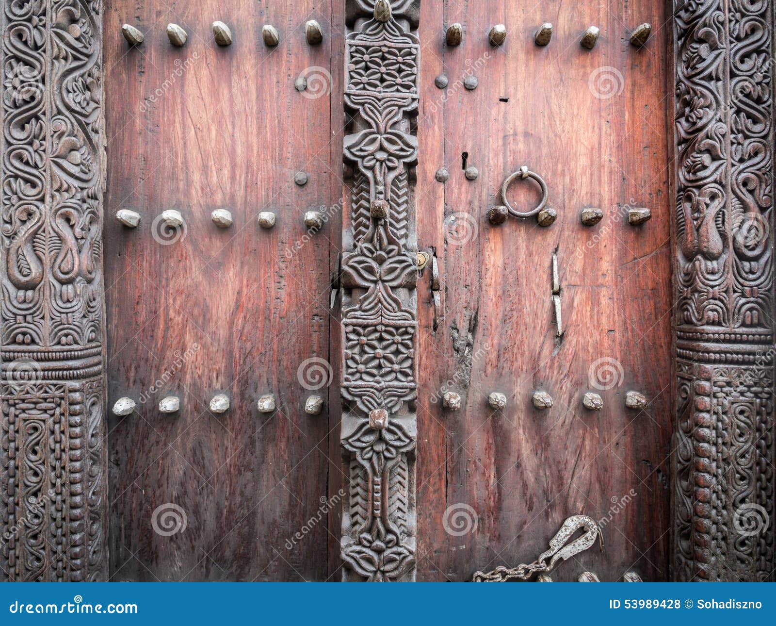 wooden carved door in stone town, zanzibar