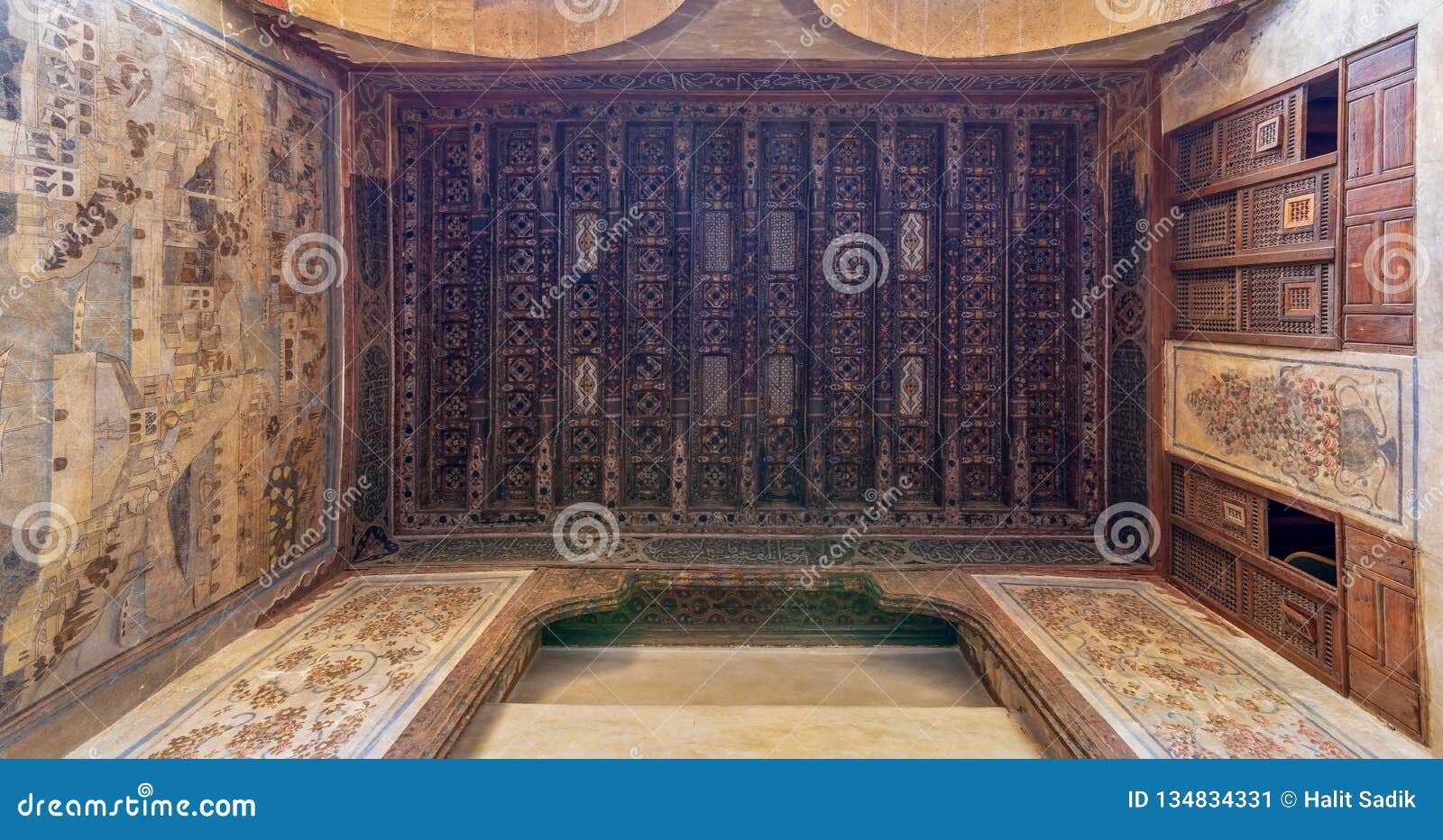 wooden ceiling decorated with floral pattern decorations and mural at historic beit el set waseela building, old cairo, egypt
