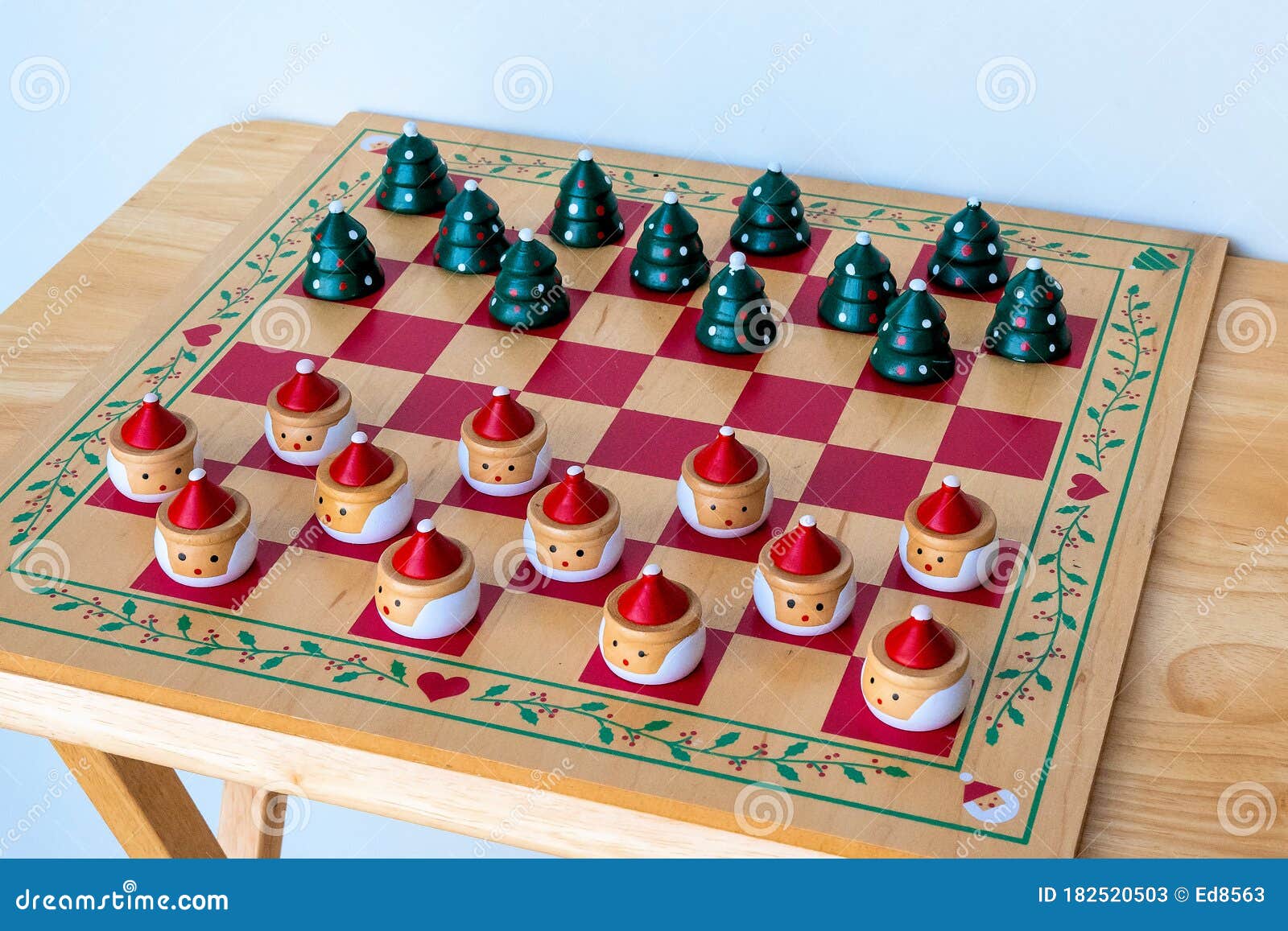 Wooden Checker Board Game with Christmas Tree and Santa Pieces Stock