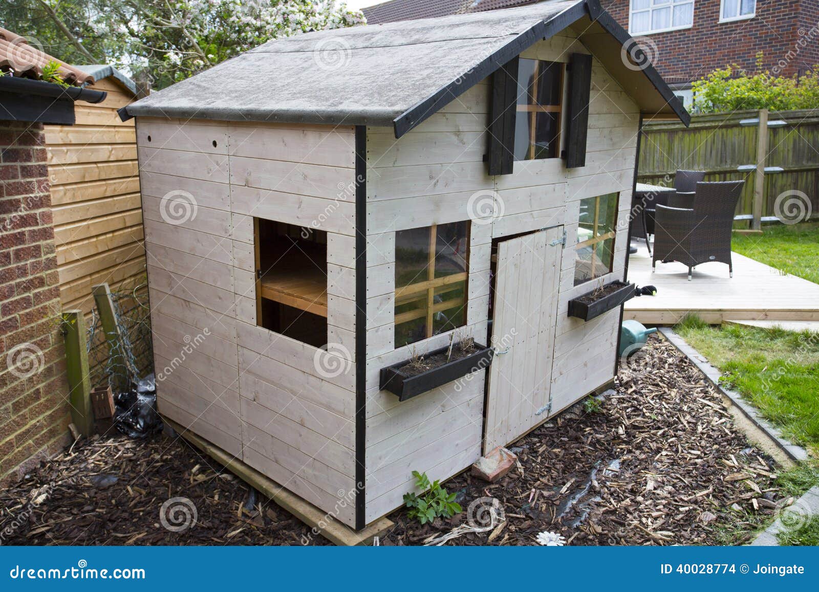 Wooden Childrens Garden Playhouse Or Shed Stock Photo 