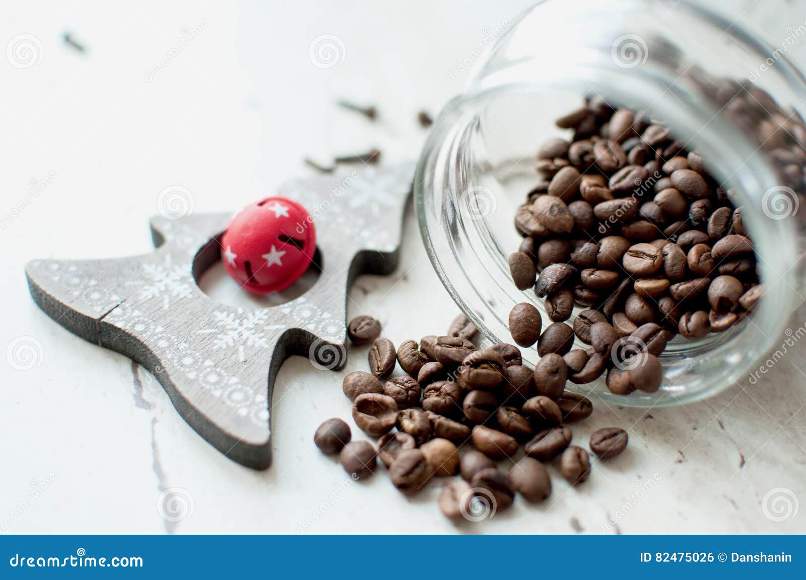 Wooden Christmas Toy and Coffee Beans on the Table. Tree, Cloves and