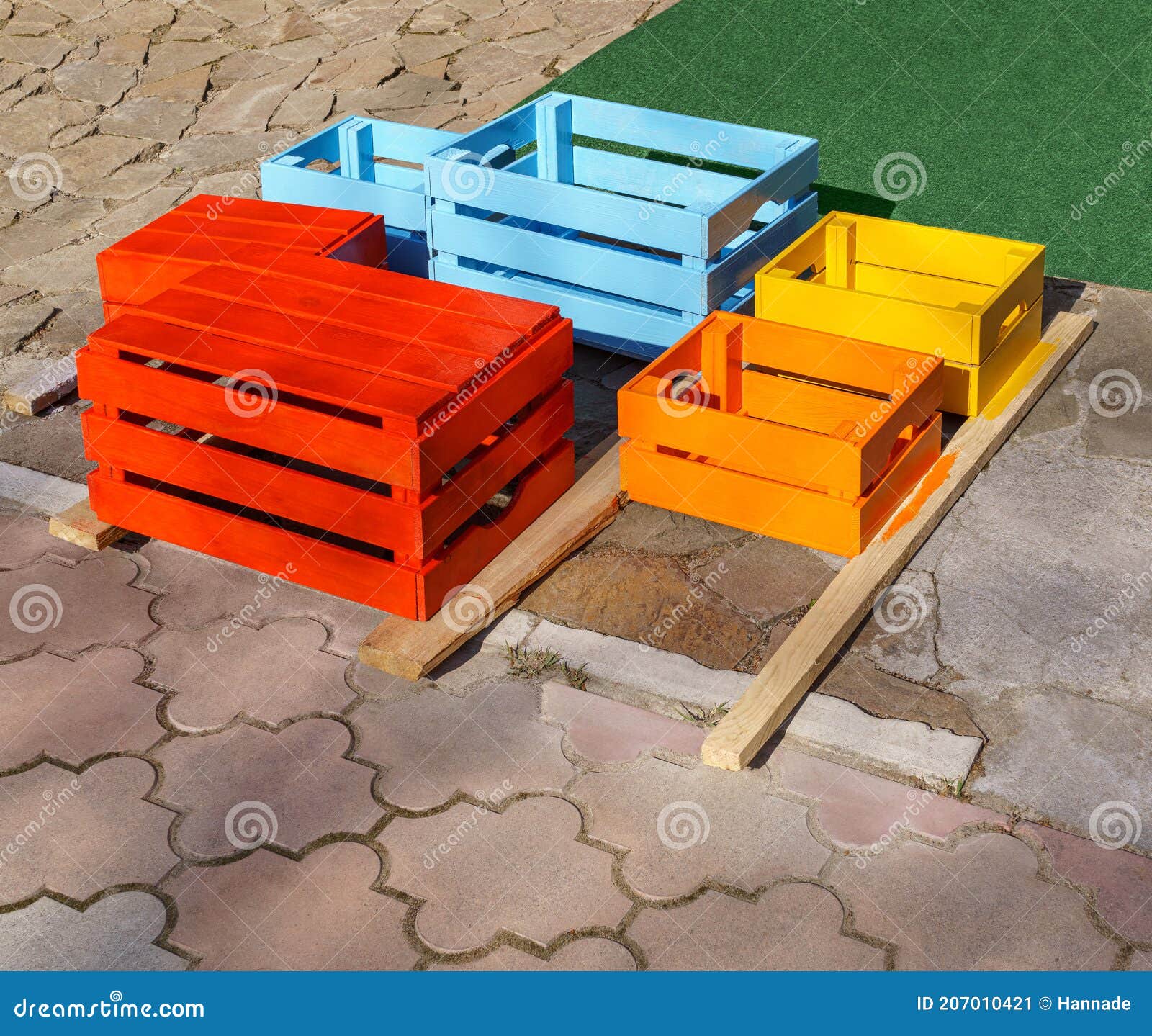 Wooden colorful crates stock image. Image of pavement 207010421