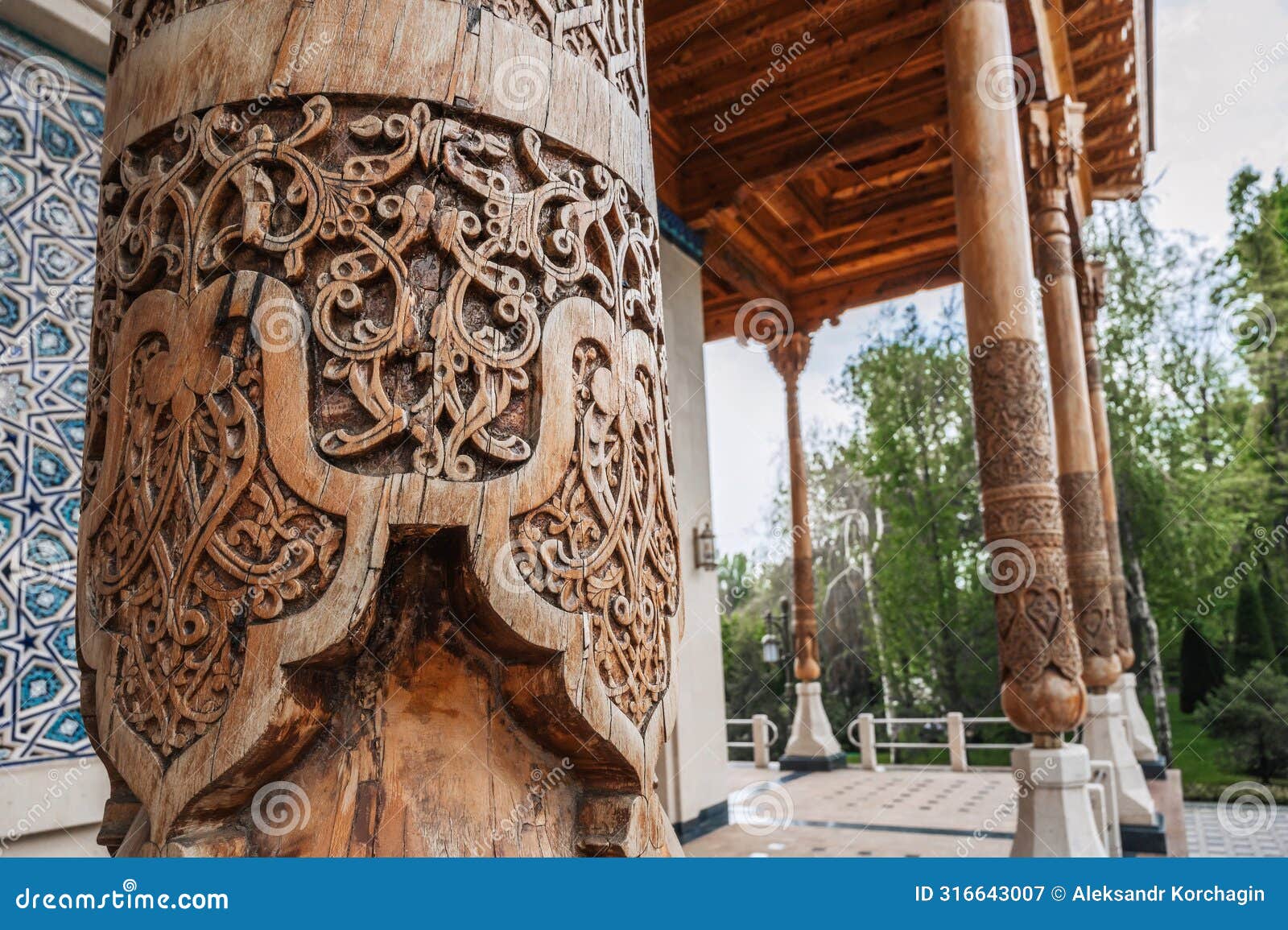 wooden column with carved oriental pattern uzbek ornament in museum of victims of political repression in tashkent in
