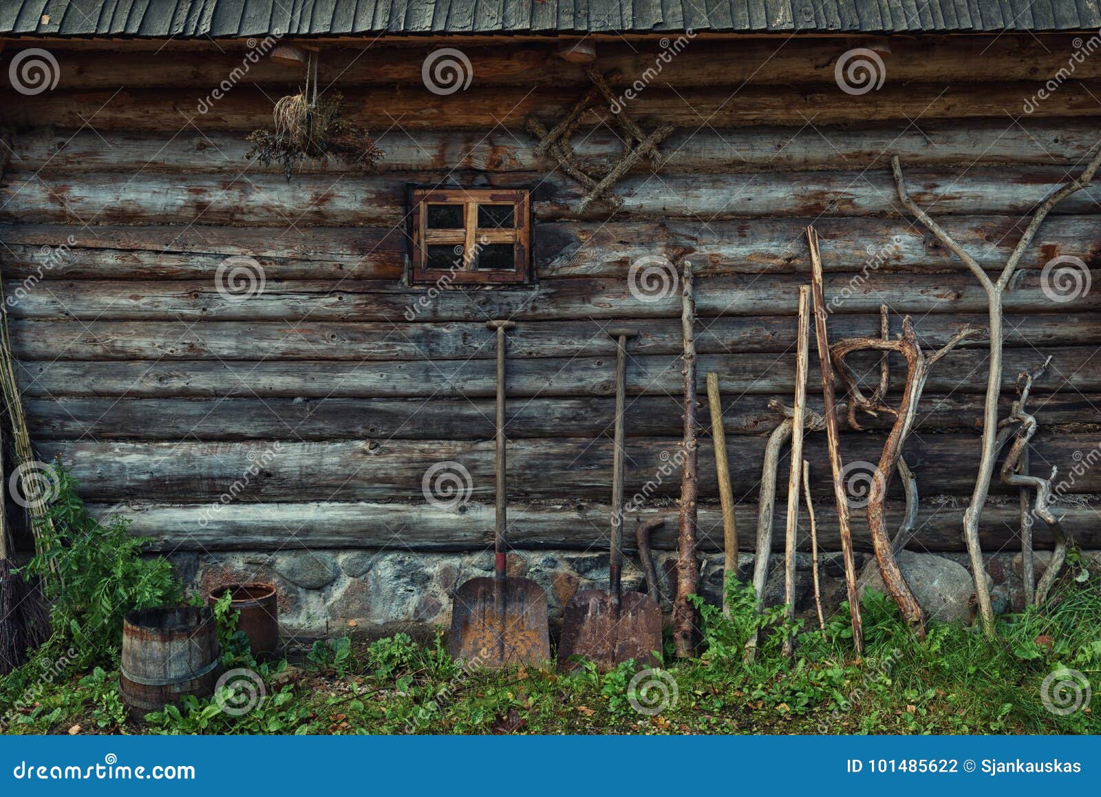 wooden barn wall texture and farming tools