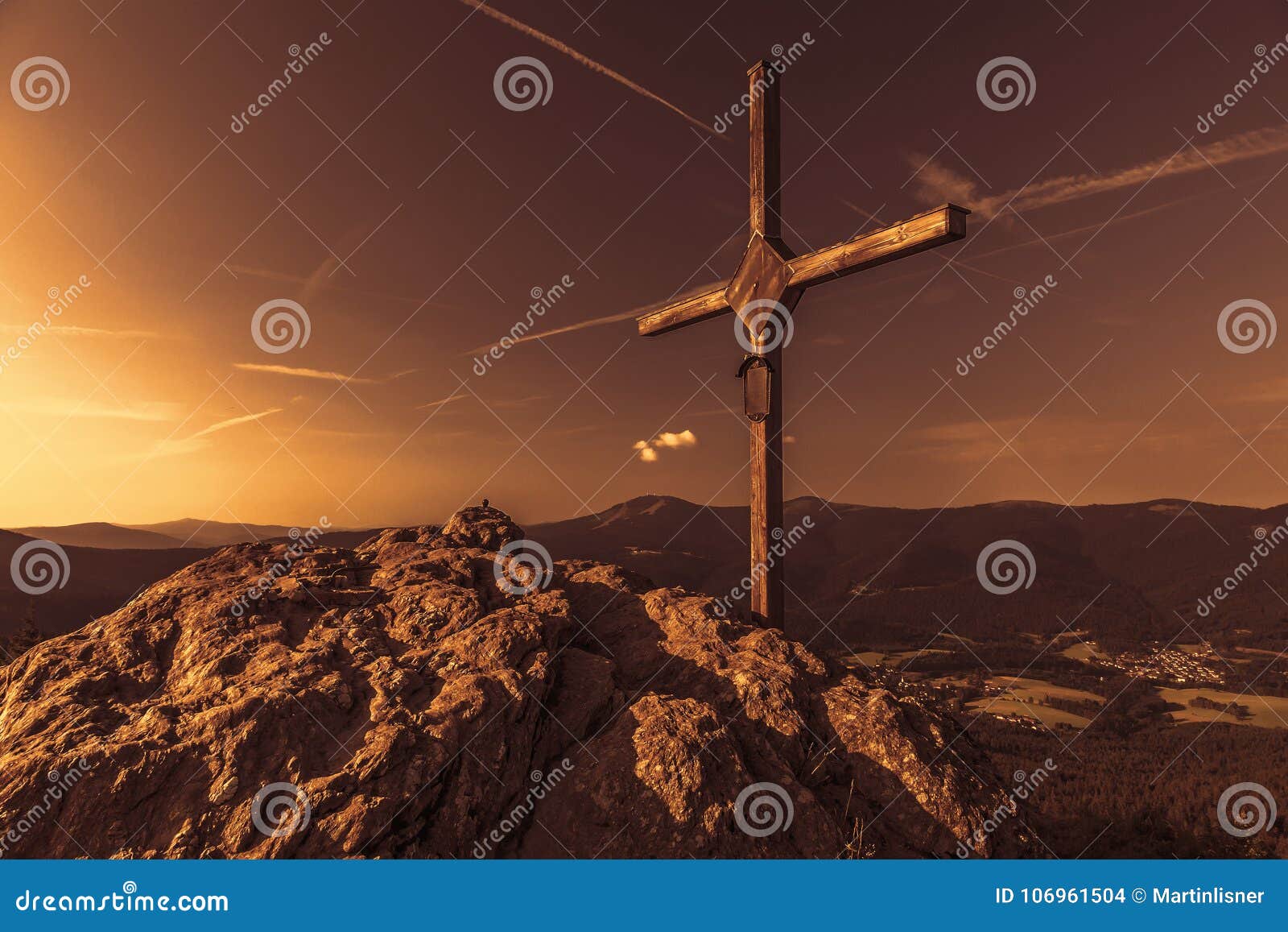 wooden cross on the summit of a mountain grosser osser in national park bavarian forest