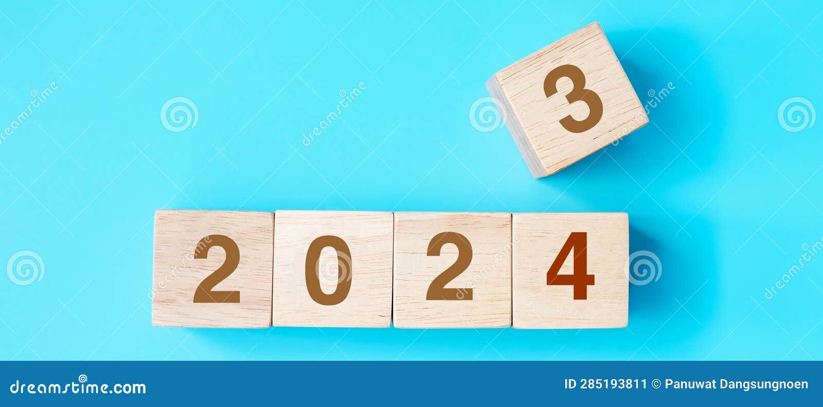 Wooden Cube Block with 2024 Text on Blue Background. Resolution, Plan