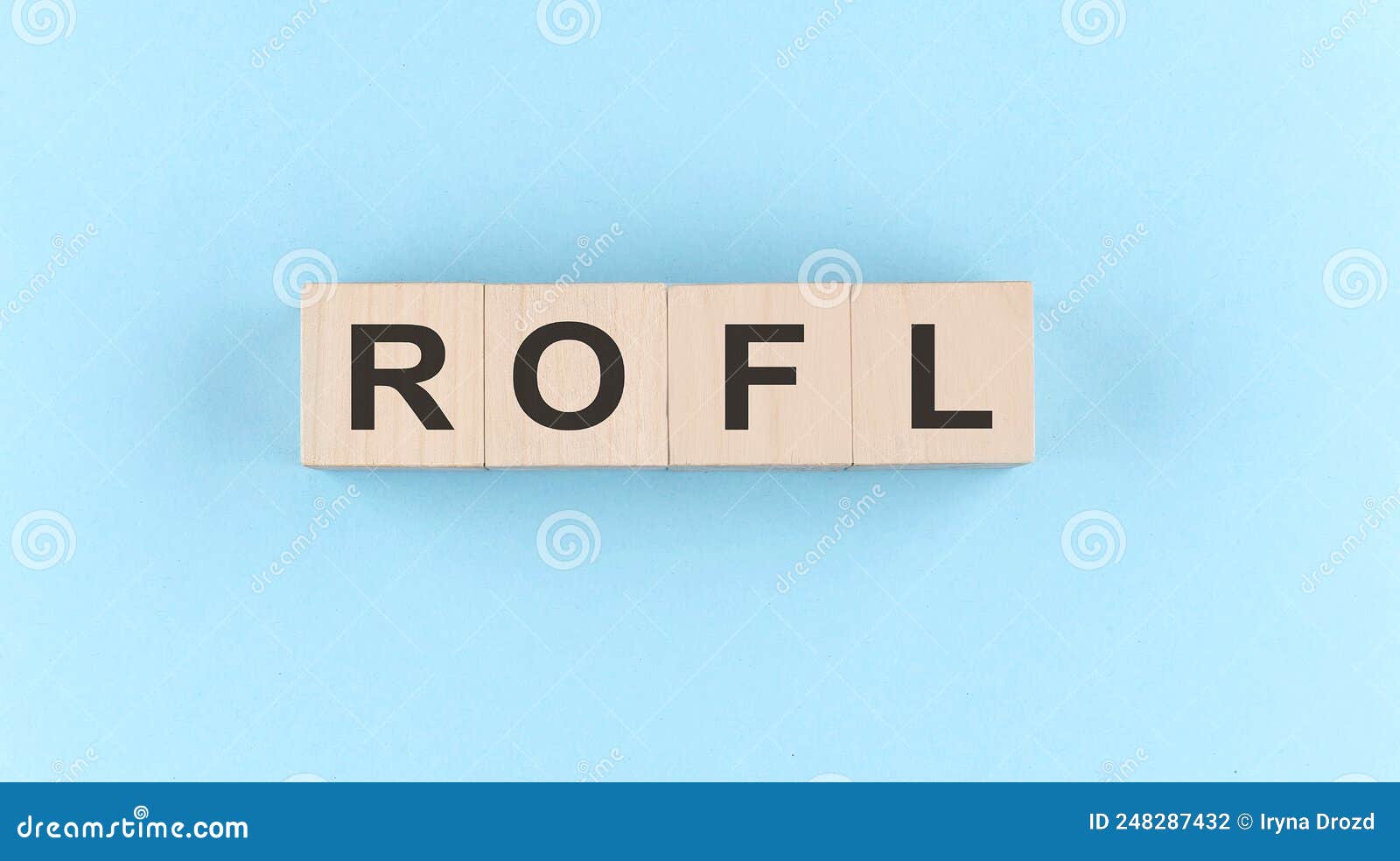 Wooden Cube Block with Text ROFL Return on Financial Leverage on the