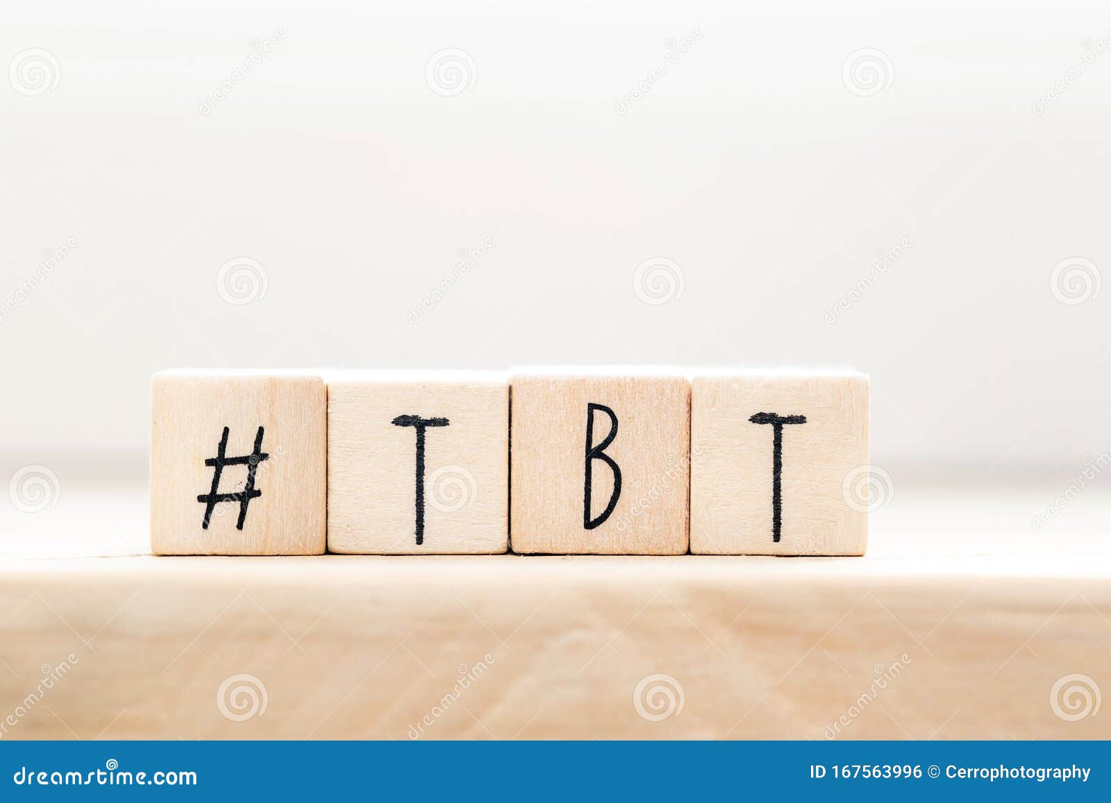 wooden cubes with hashtag tbt, meaning throwback thursday near white background social media concept
