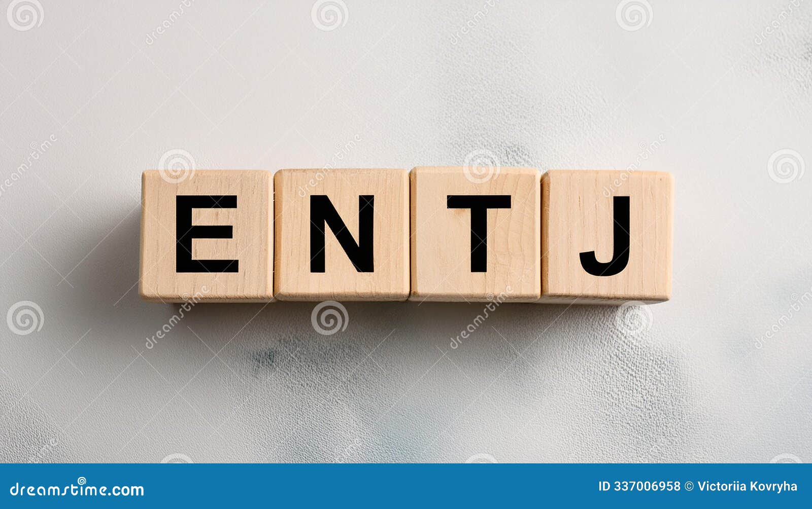 wooden cubes with text entj. extraverted, intuitive, thinking, judging. personality type. close-up