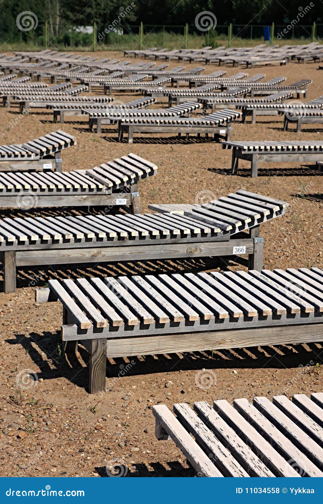 Wooden deck-chairs stock photo. Image of deck, requiring - 11034558