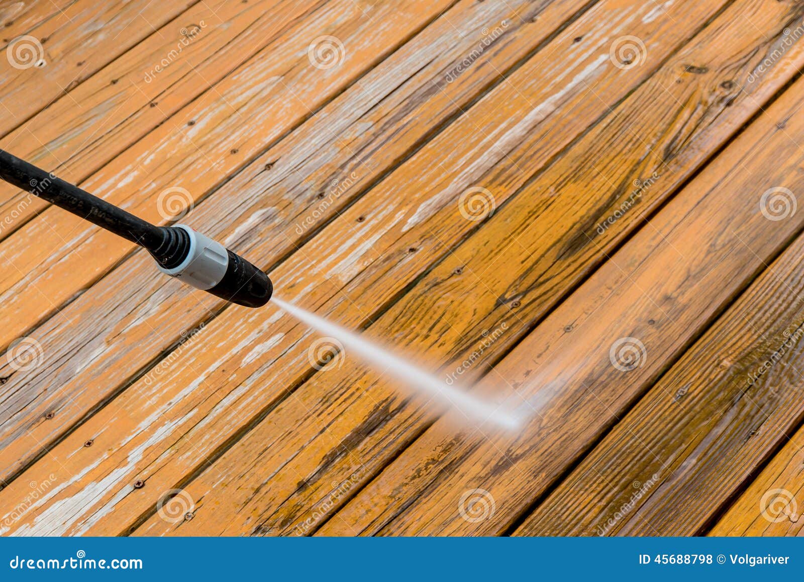 wooden deck floor cleaning with high pressure water jet.