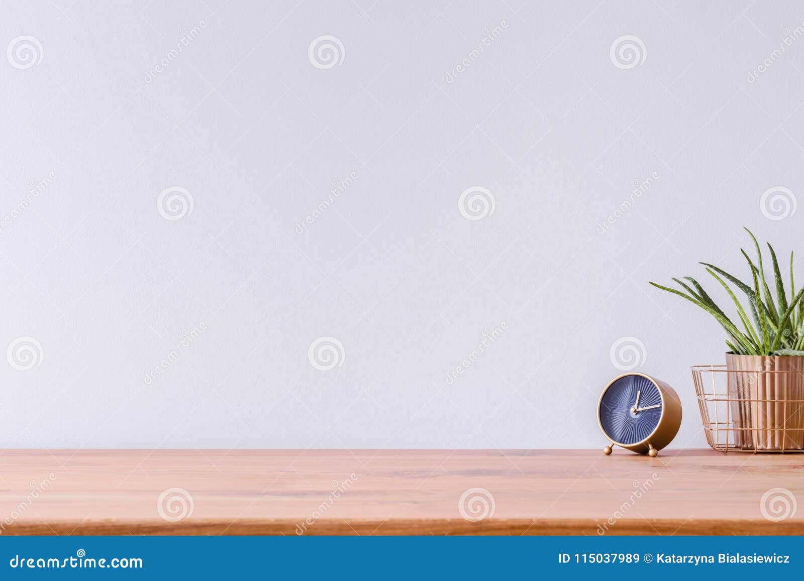 wooden desk and empty wall