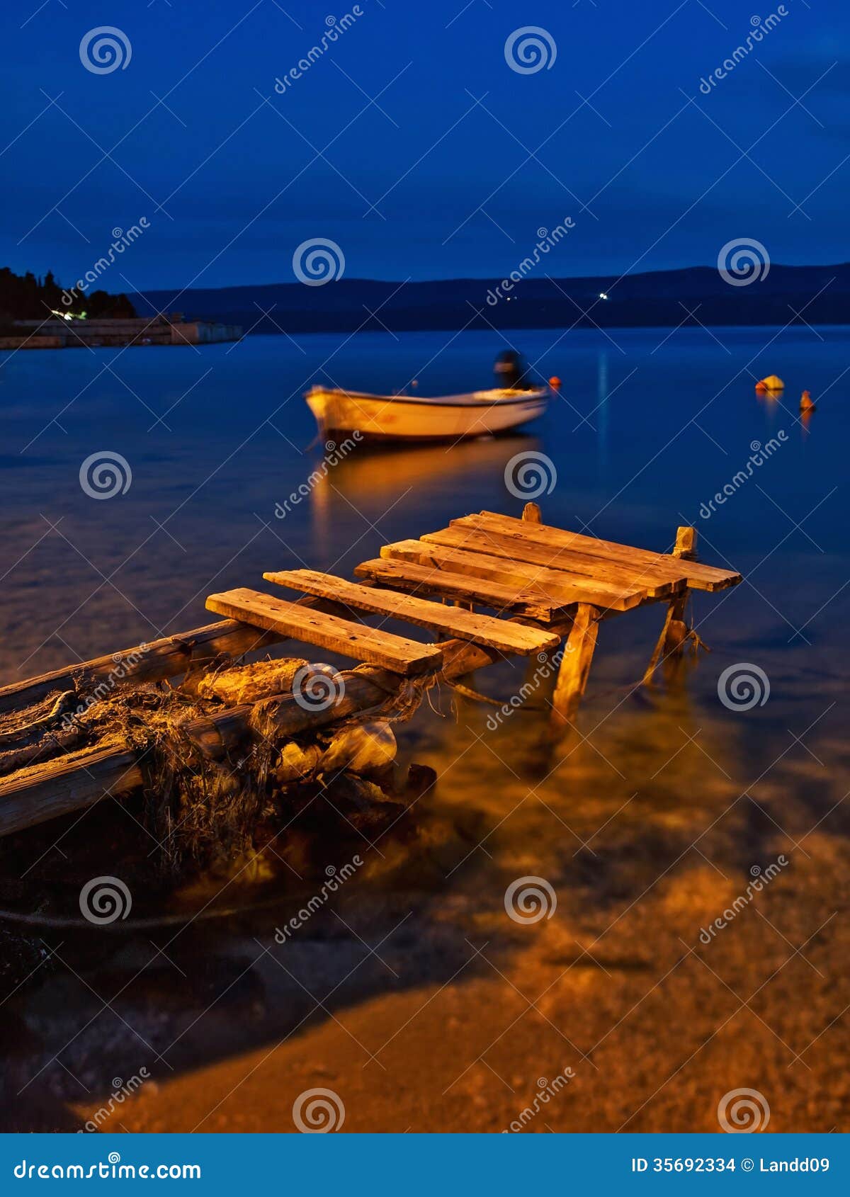 Wooden Dock And Boat At Night Stock Photo - Image of lake ...