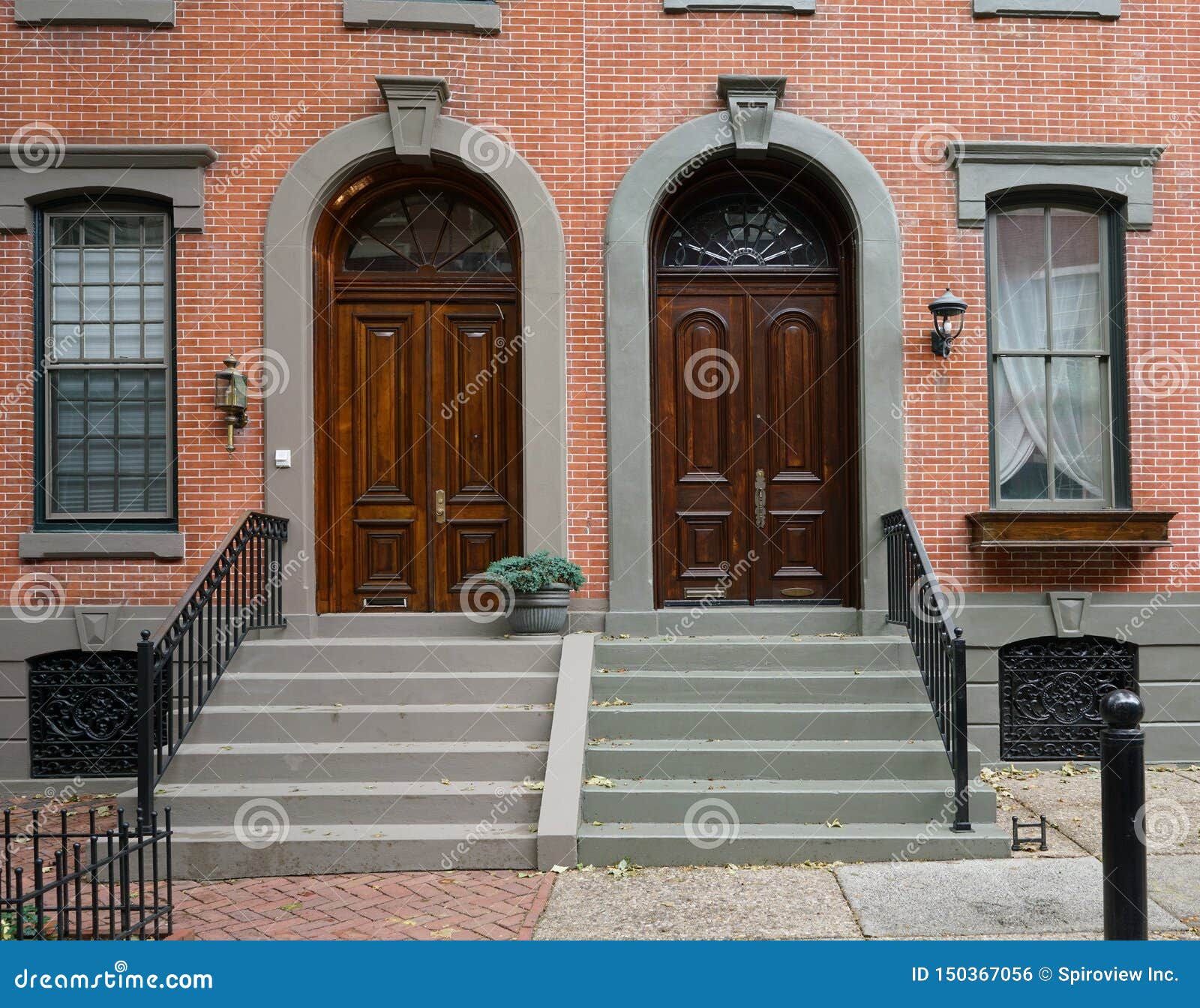 Wooden Front Doors of Brick Townhouses Stock Photo Image of