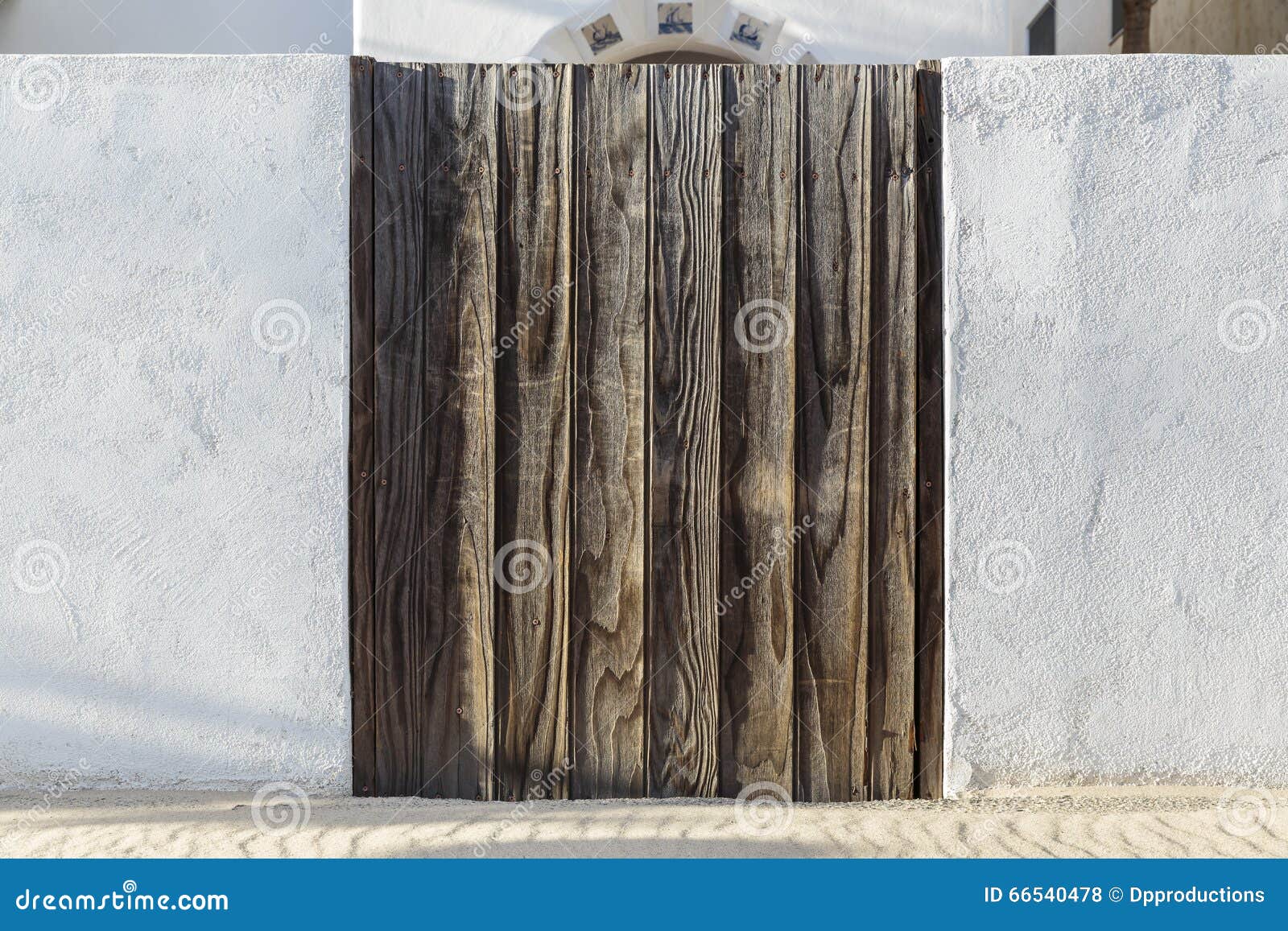 Wooden gated entryway stock photo. Image of plaster, brown 66540478