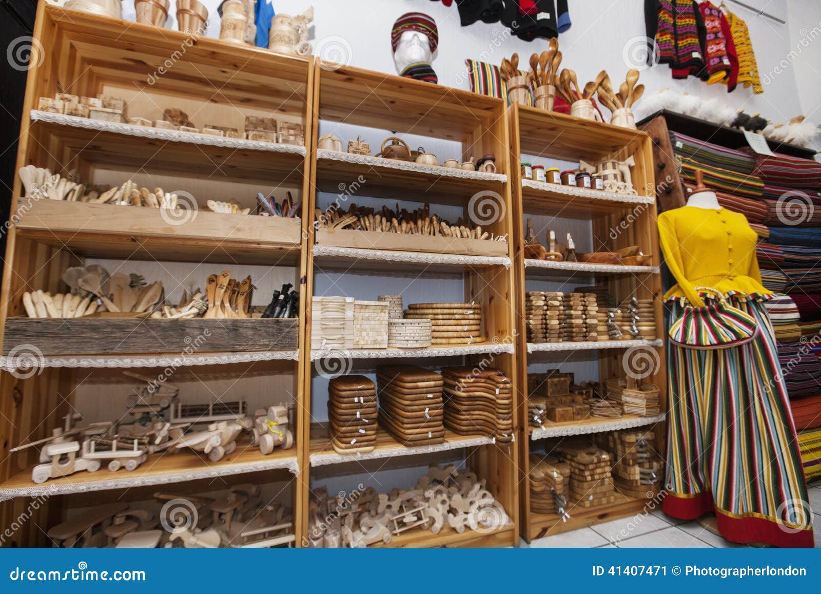 Wooden Handicrafts Displayed On Shelves In Gift Store 