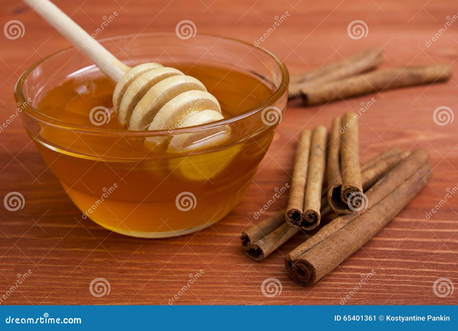 Wooden Honey Stick and Cinnamon Sticks. Stock Image Image of product