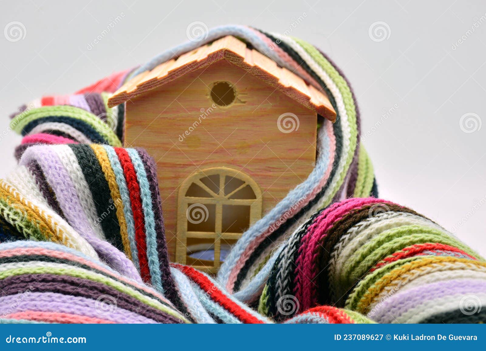 wooden house sheltered with a scarf