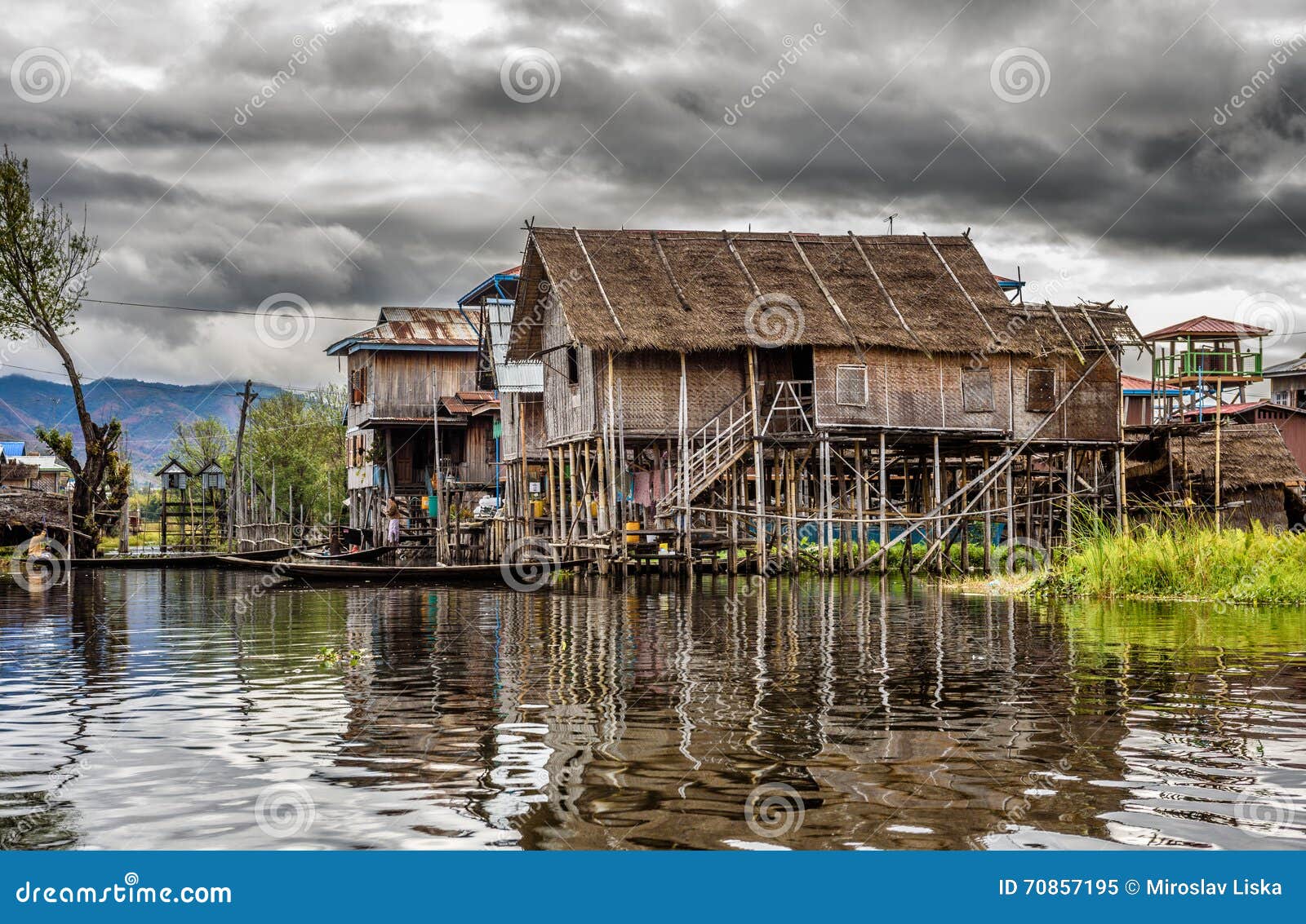 wooden houses on piles, inle lake, myanmar