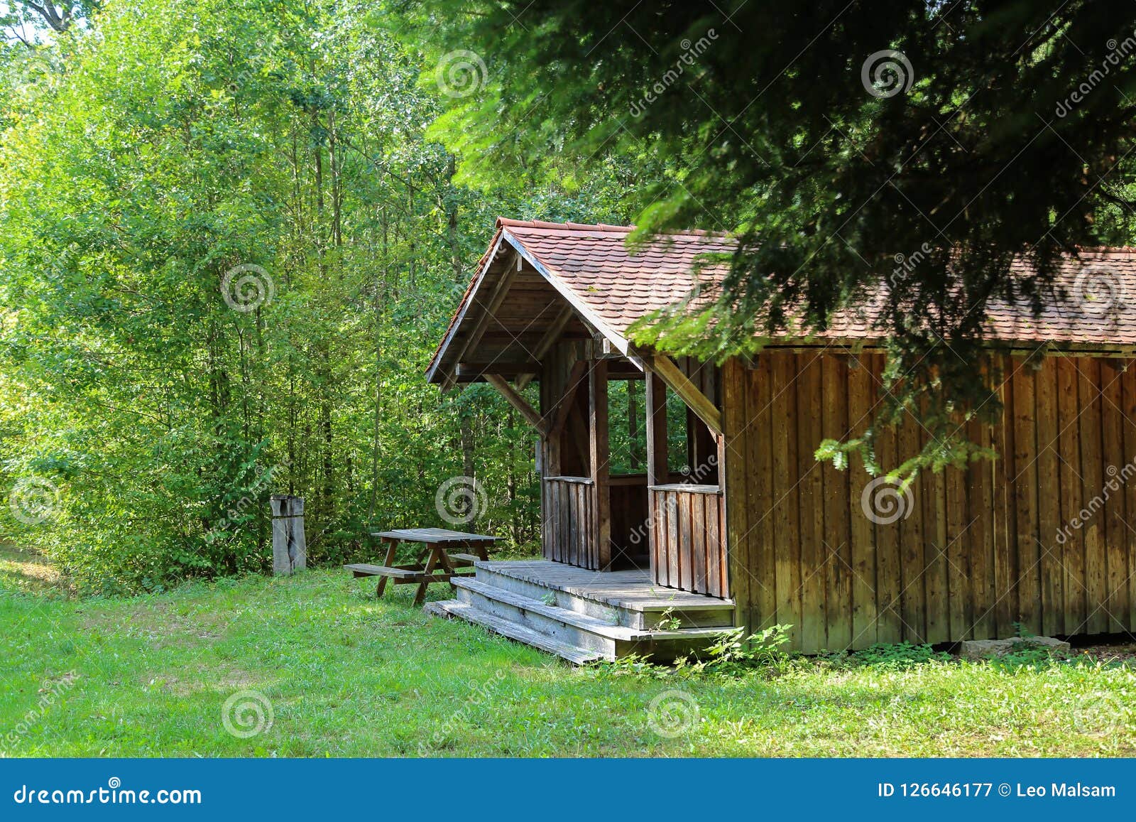 Wooden Hut in the Forest stock image. Image of background - 126646177