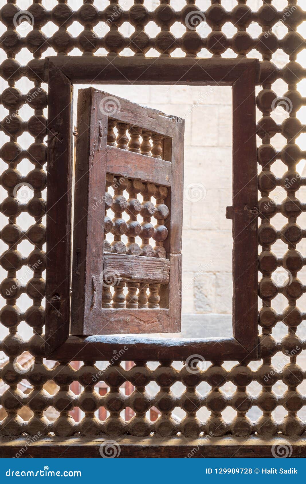 wooden latticed window mashrabiya with one small swinging sash