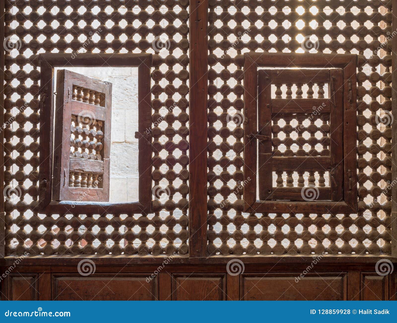 wooden latticed window mashrabiya with two small swinging sashes