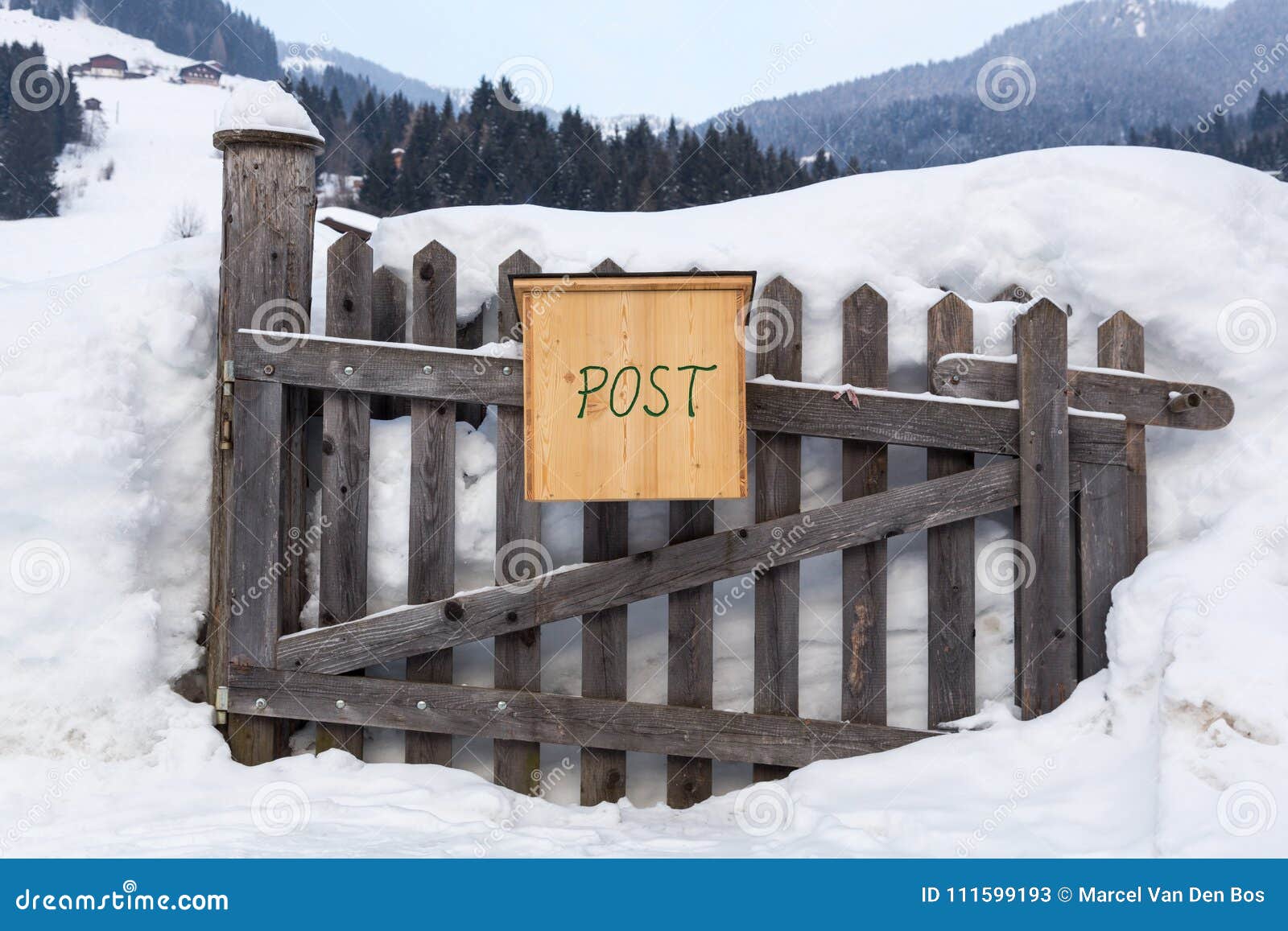 Wooden mailbox in the snow stock image. Image of cold 111599193