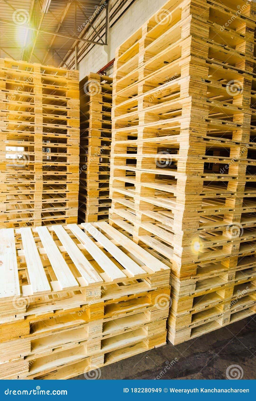 Wooden Pallets Stack at the Freight Cargo Warehouse for Transportation