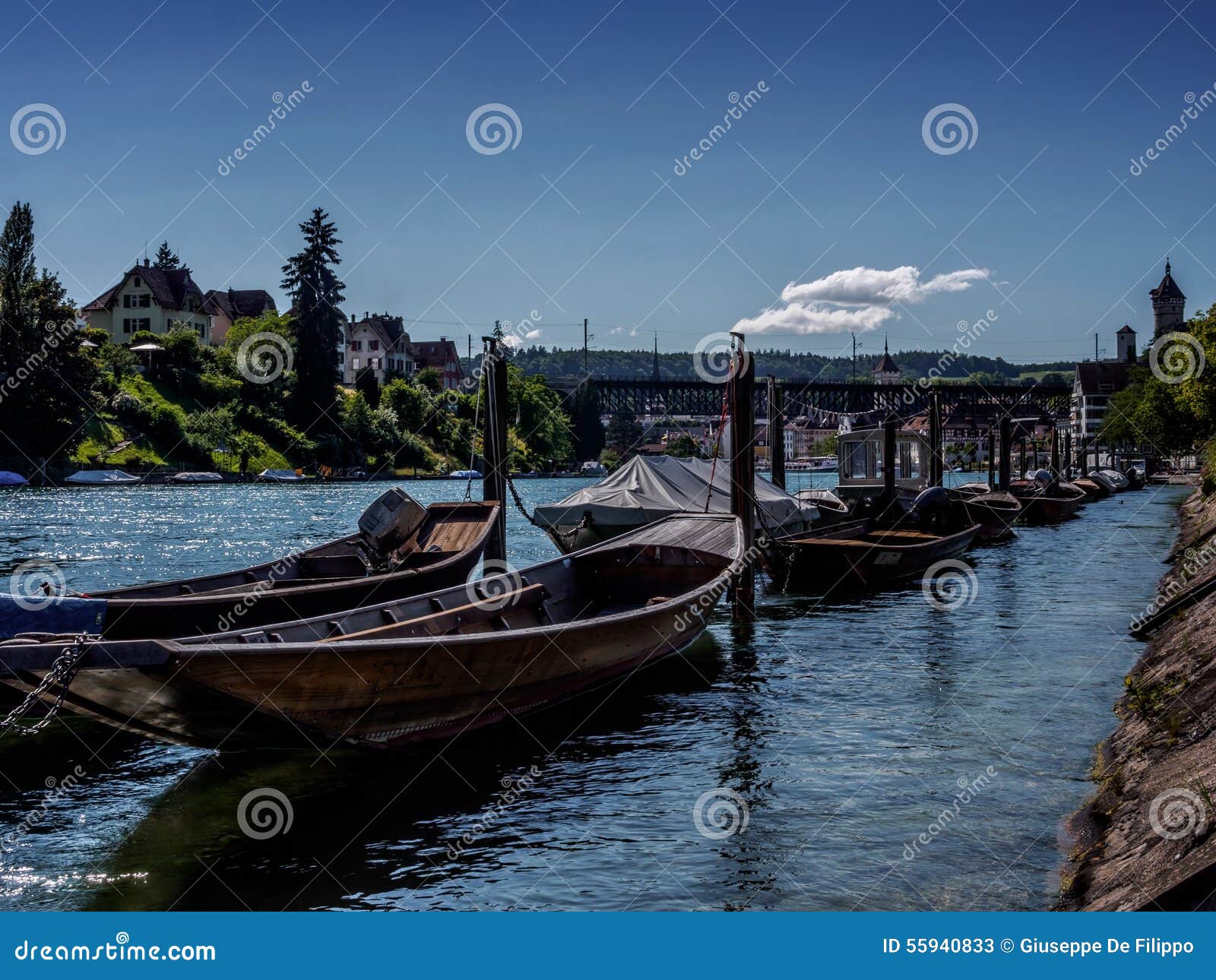 wooden pirogues waiting on the rhein