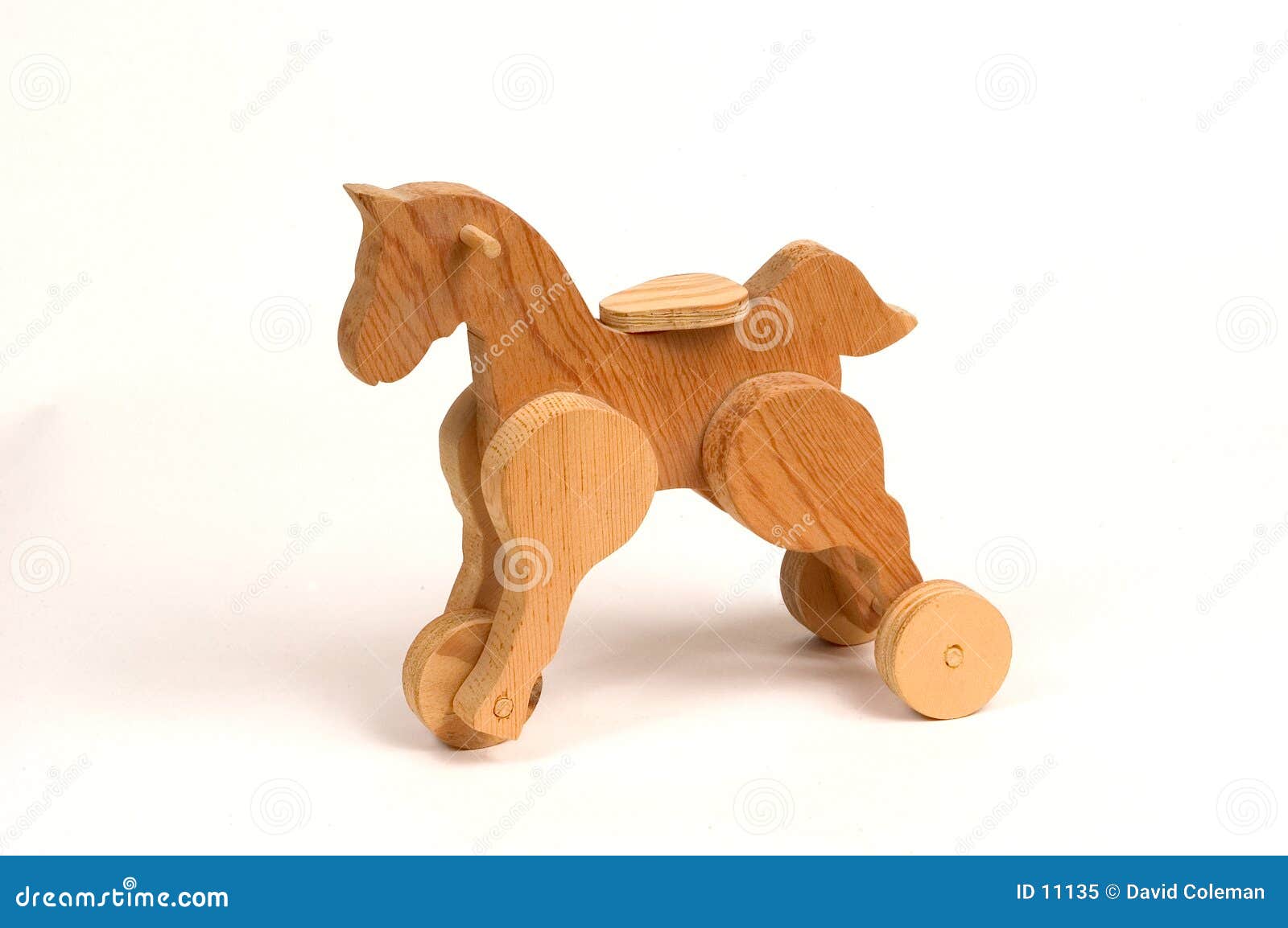 Wooden pull toy stock image. Image of saddle, wheels ...