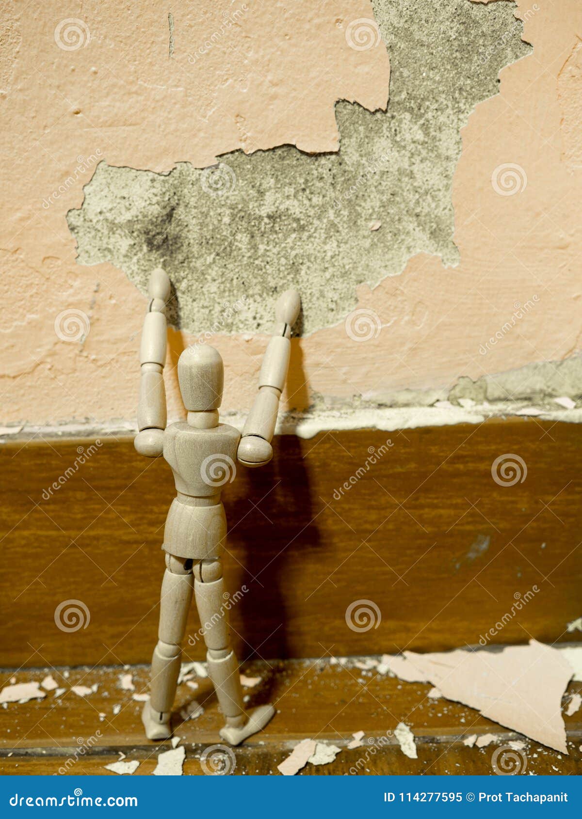 Wooden Puppet Tried To Fix Old Paint Peeling Plaster Walls Damage