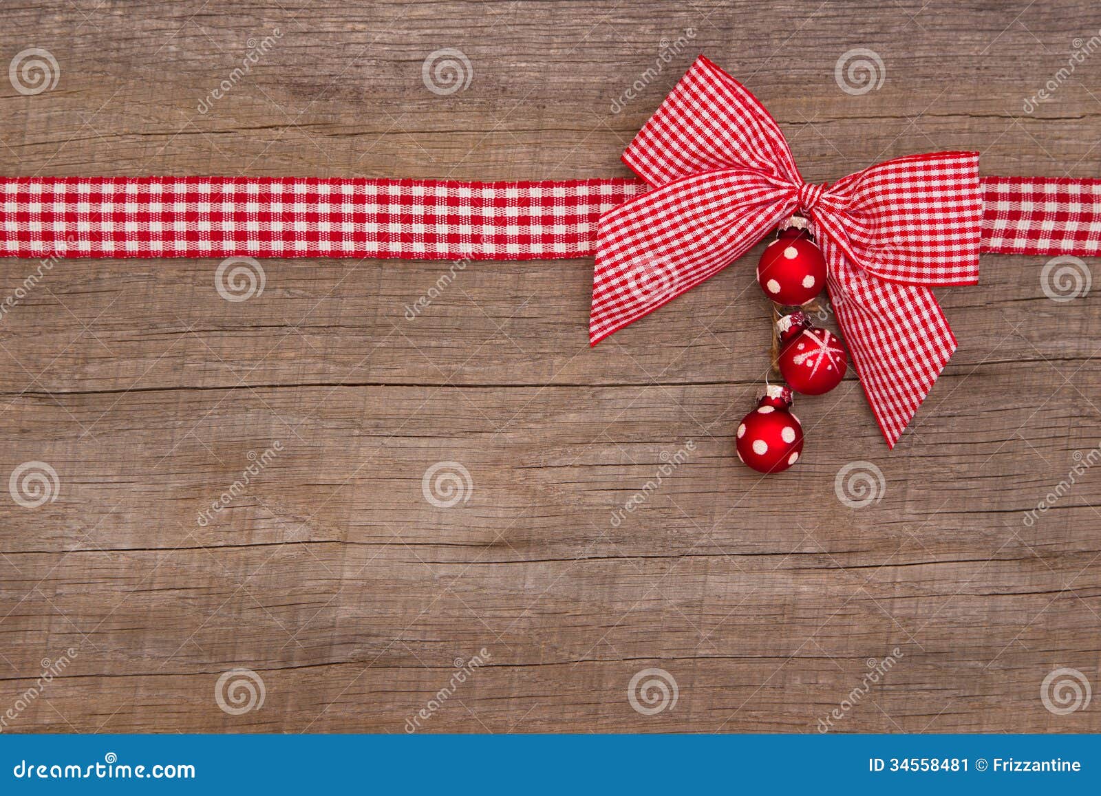 wooden red christmas background with a white checked ribbon