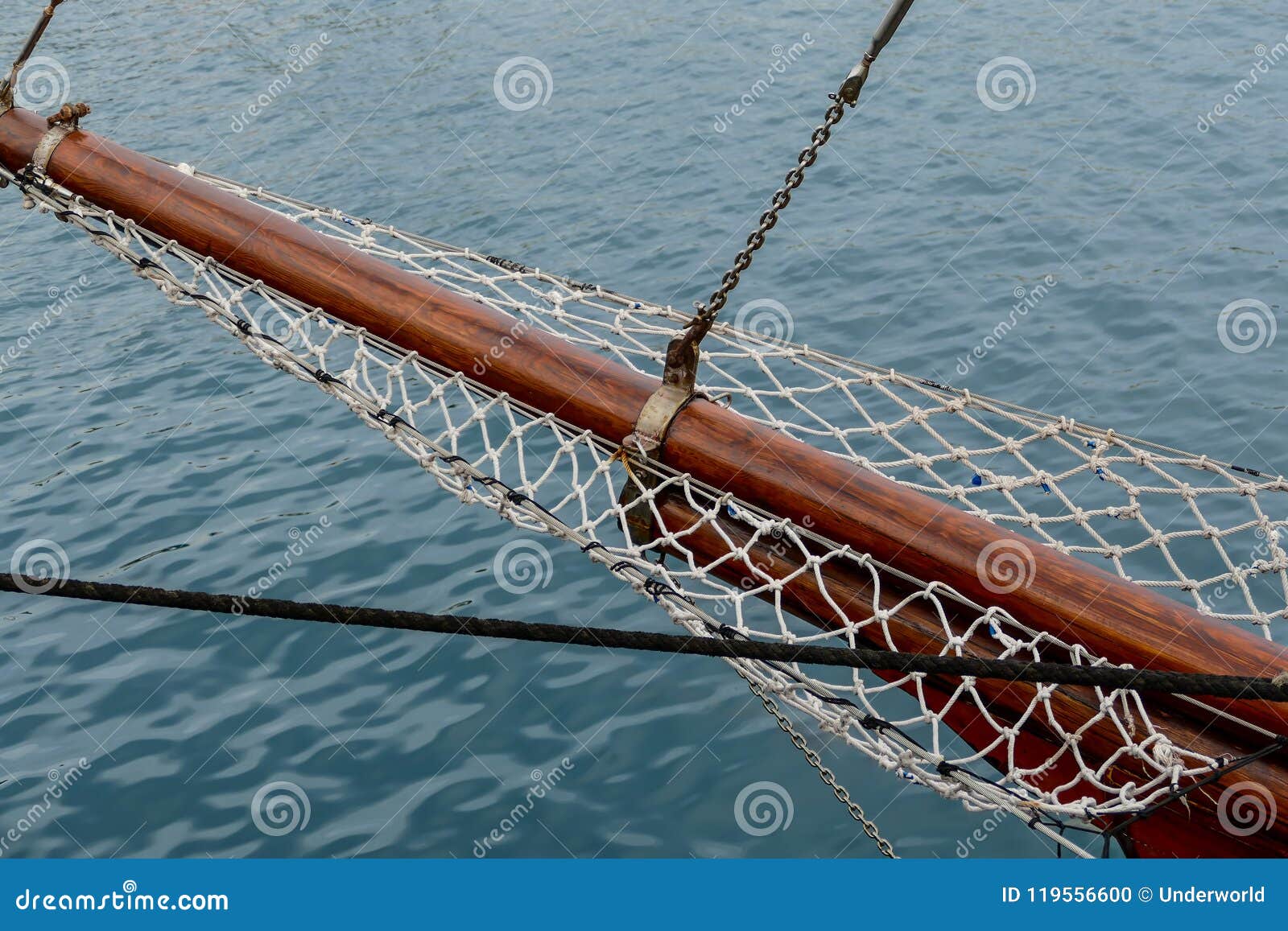 Wooden Sailboat On The Blue Mediterranean Sea Details Of A Classic Beautiful Sailing Yacht With Ropes Knots And Wood Plank On Deck Stock Photo Image Of Yacht Equipment Wooden Sailboat On The Blue Mediterranean Sea Details Of A Classic Beautiful Sailing Yacht With Ropes Knots And Wood Plank On Deck Stock Photo Image Of Yacht Equipment