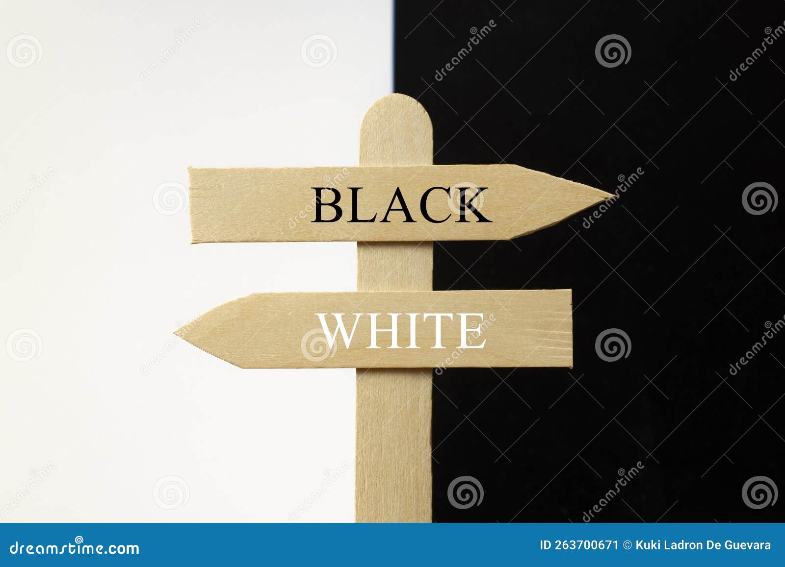wooden sign with the words black and white