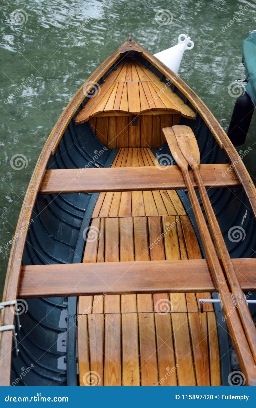 Wooden Small Boat and Paddles Stock Photo - Image of lake, fishing:  115897420