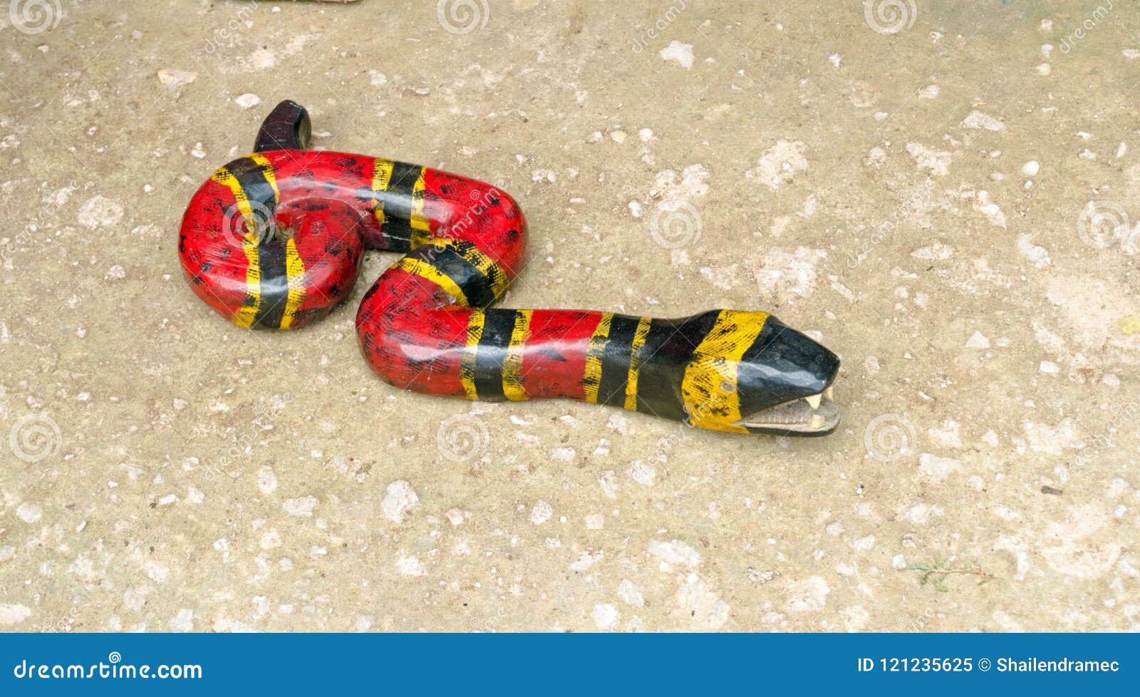 Wooden snake art piece stock image. Image of floor, reptiles 121235625