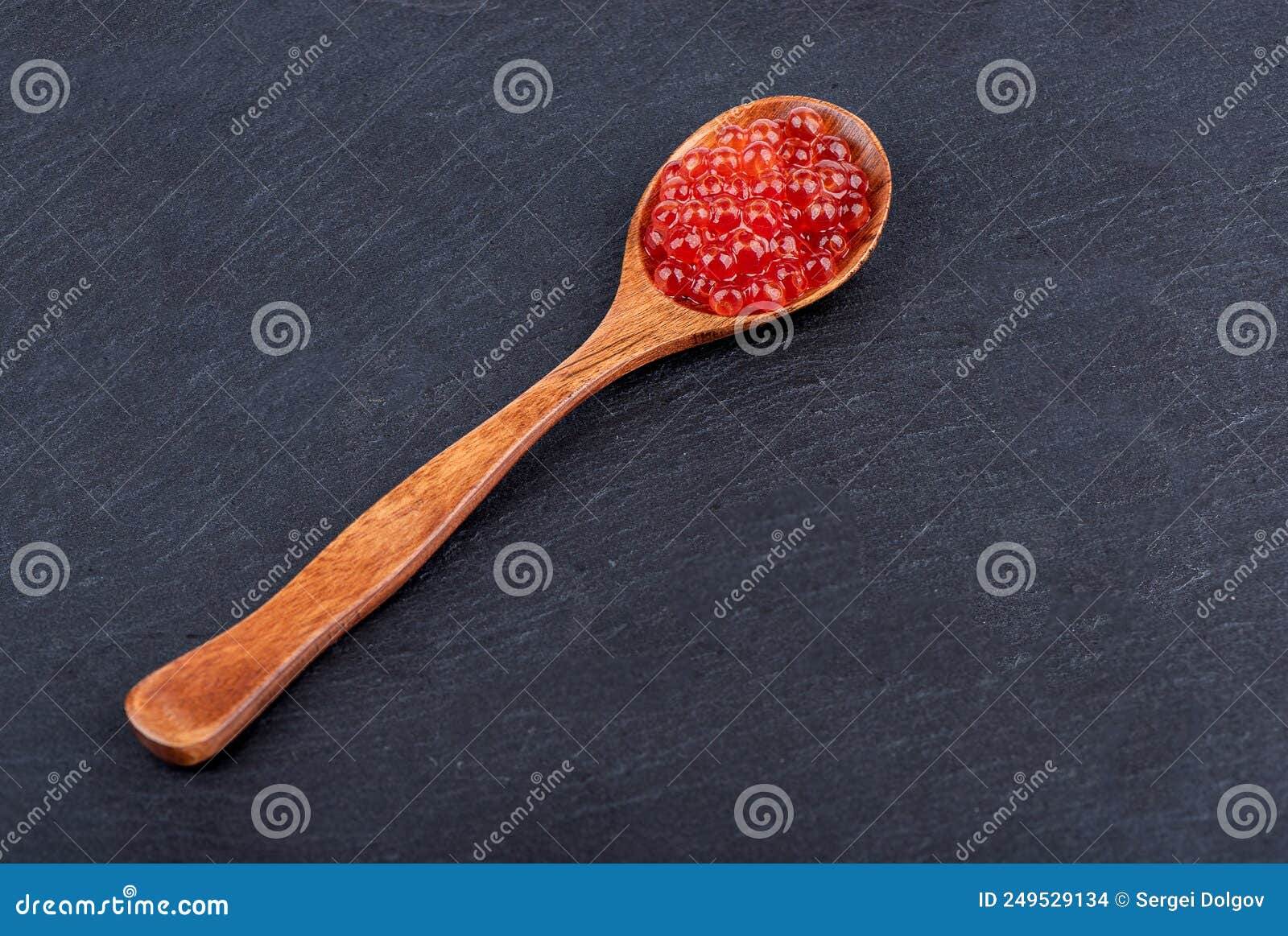 Wooden Spoon with Red Caviar on a Stone Surface. Stock Photo Image of expensive, appetizer