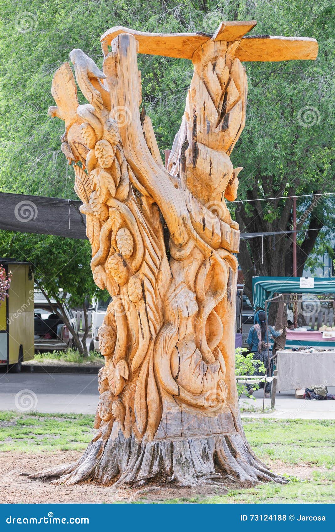 wooden statue located in a public park bolson, argentina