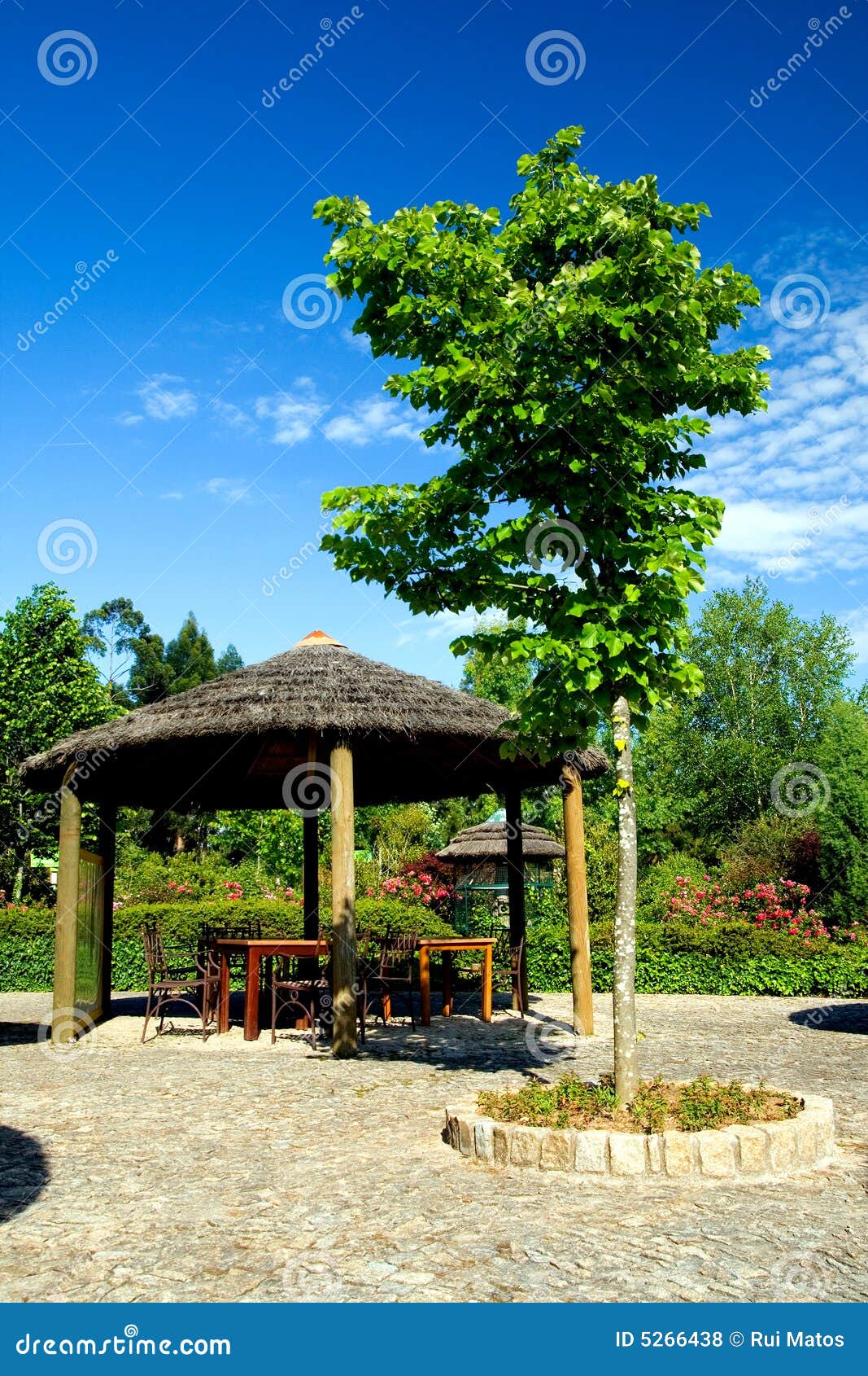 wooden sunshade on a resort garden