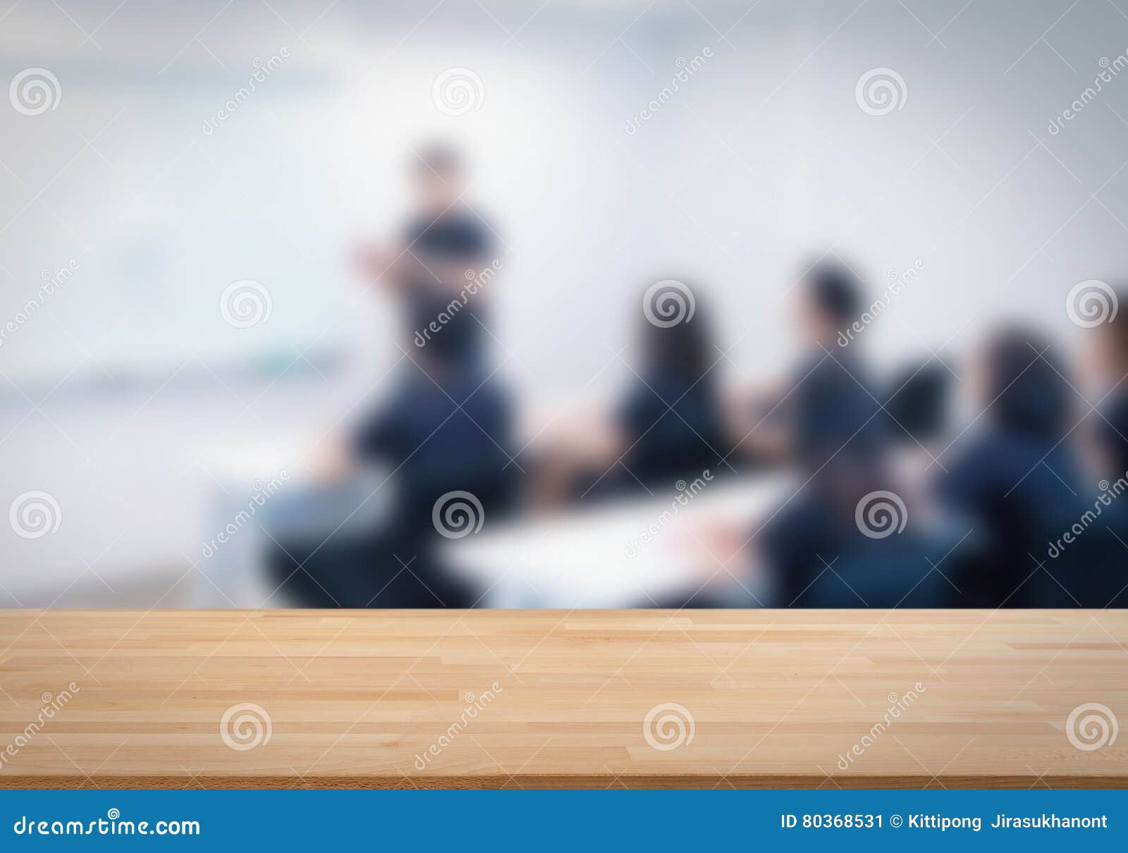 Wooden Table with Business Meeting Background Stock Image - Image of
