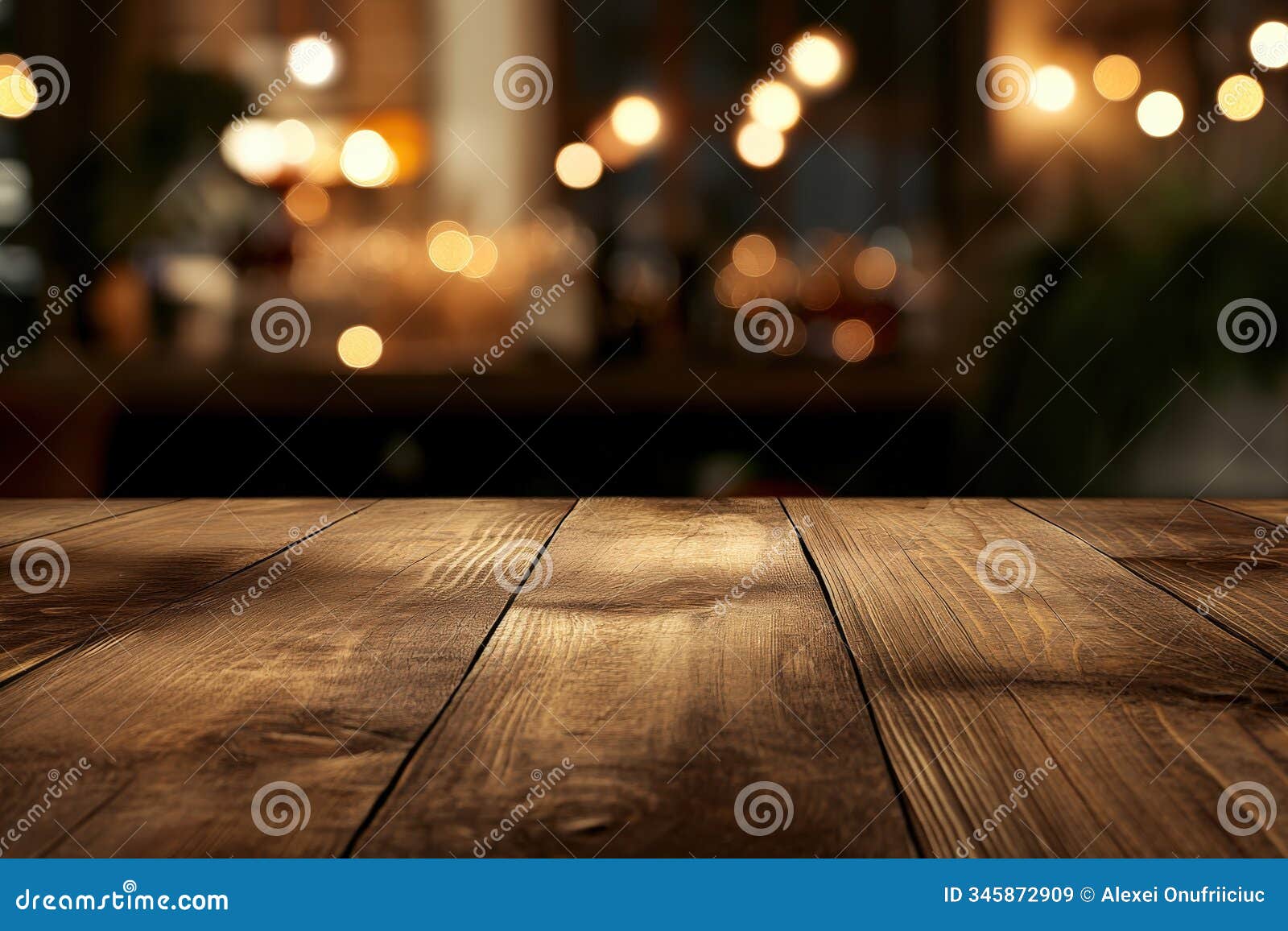 a wooden table with colorful christmas lights in the background