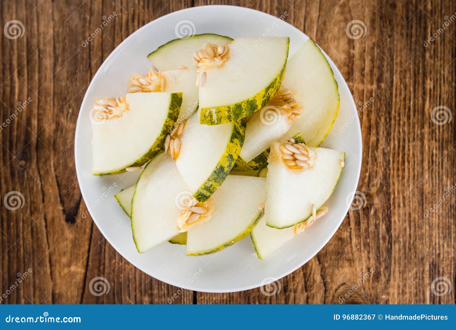 wooden table with futuro melons selective focus