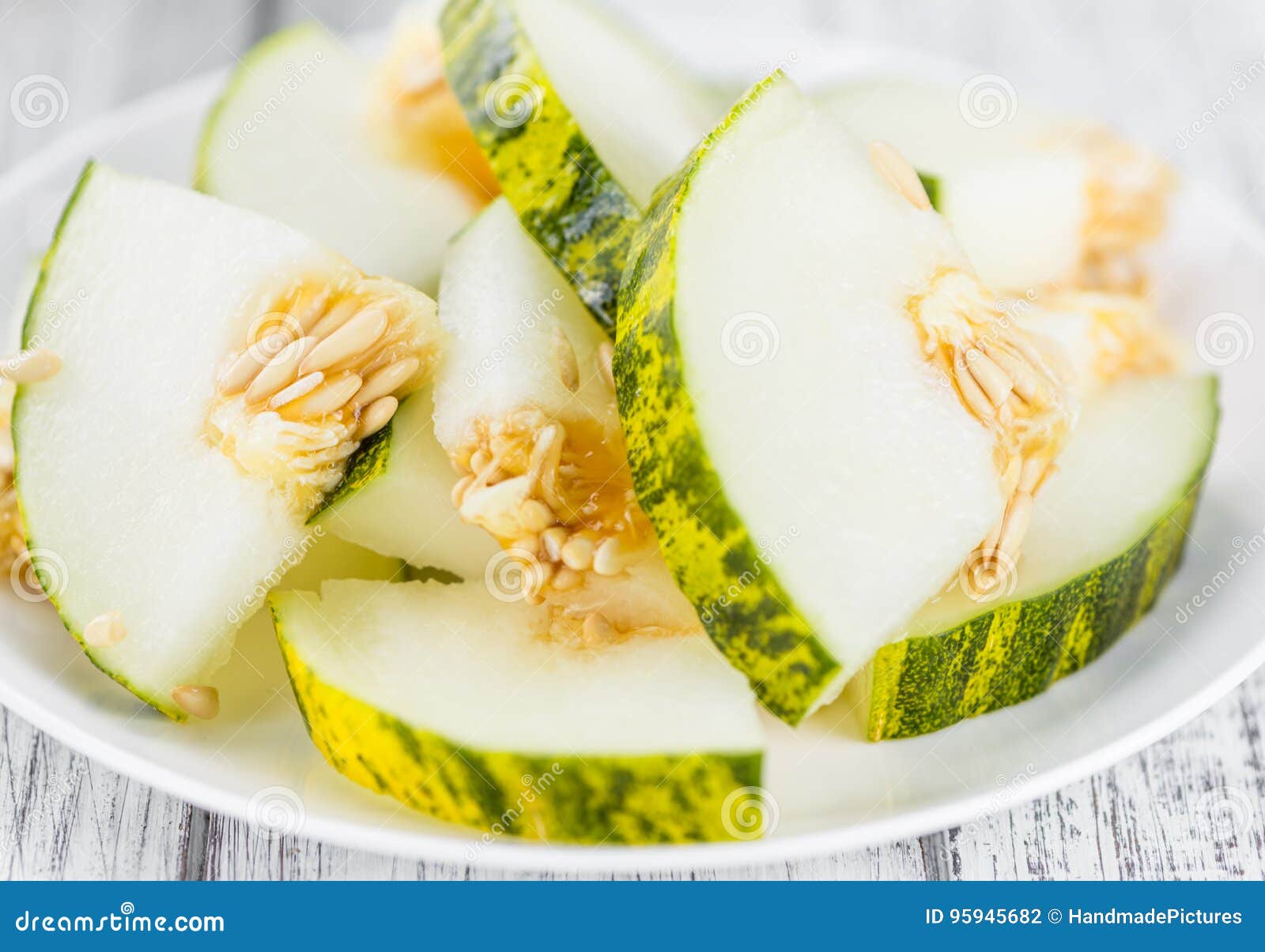 wooden table with futuro melons & x28;selective focus& x29;